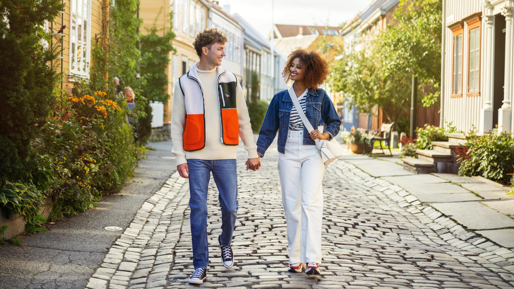 Couple strolling in Bakklandet