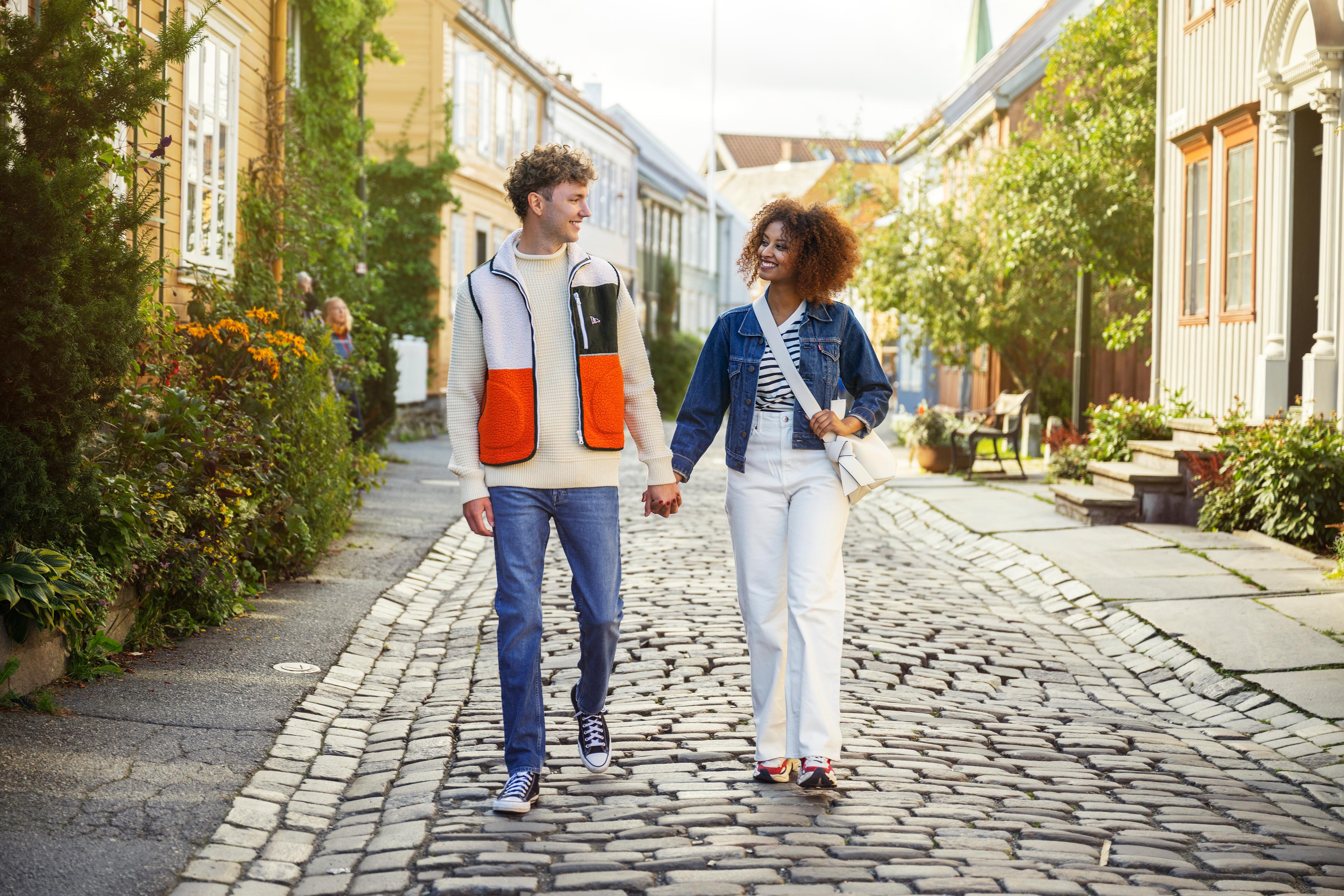 Couple strolling in Bakklandet