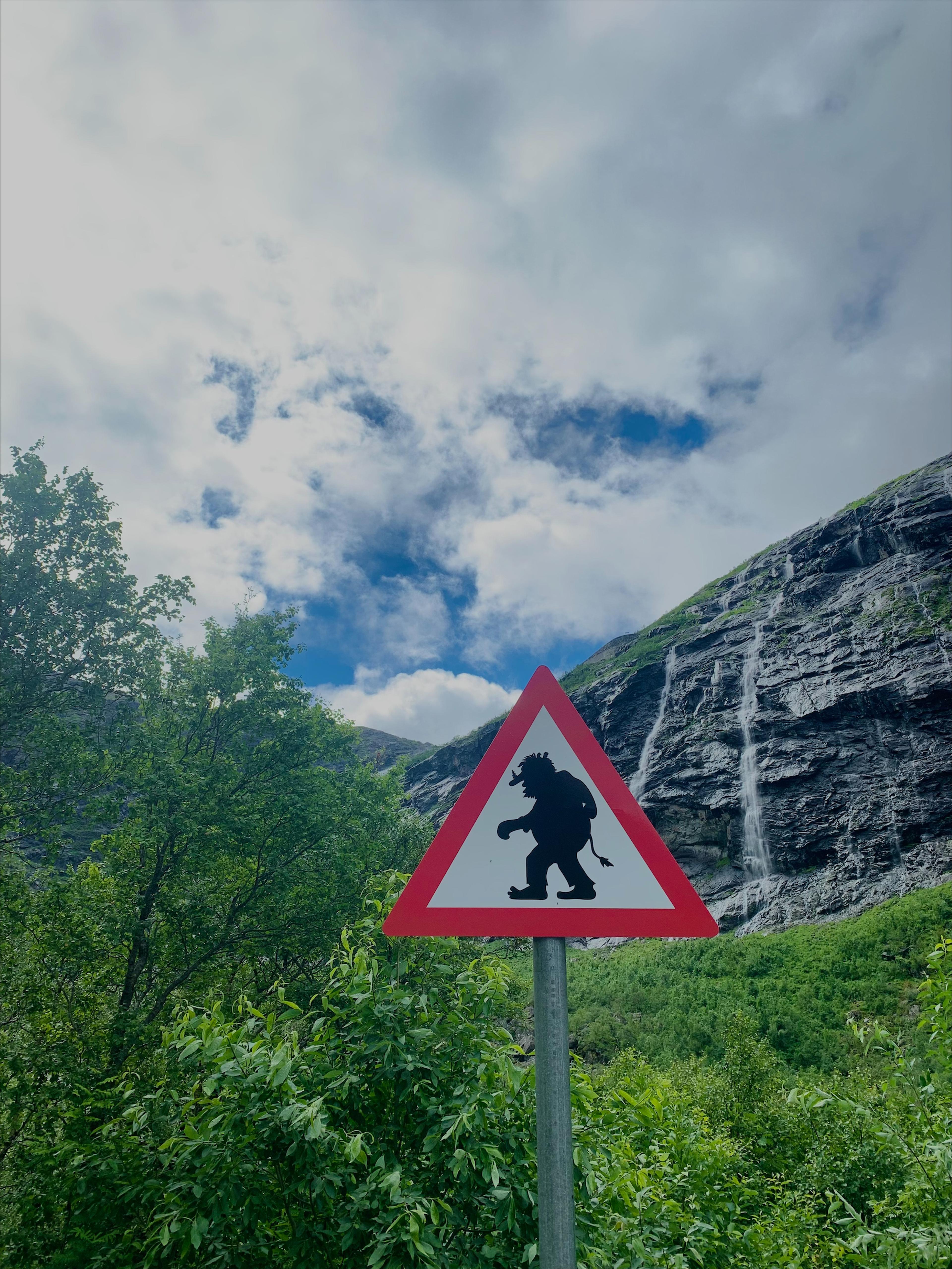 A warning sign showing a troll in Romsdalen