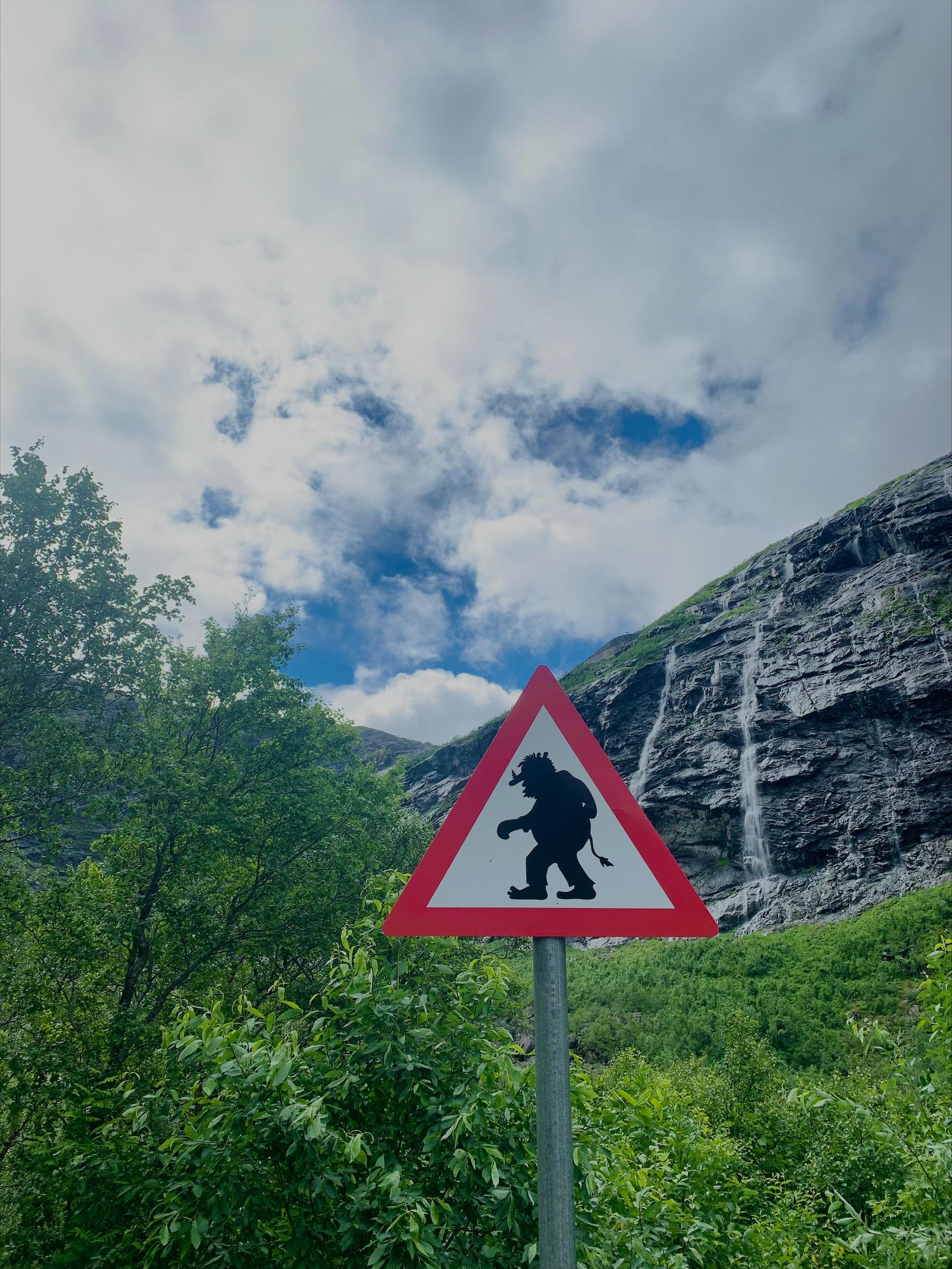 A warning sign showing a troll in Romsdalen