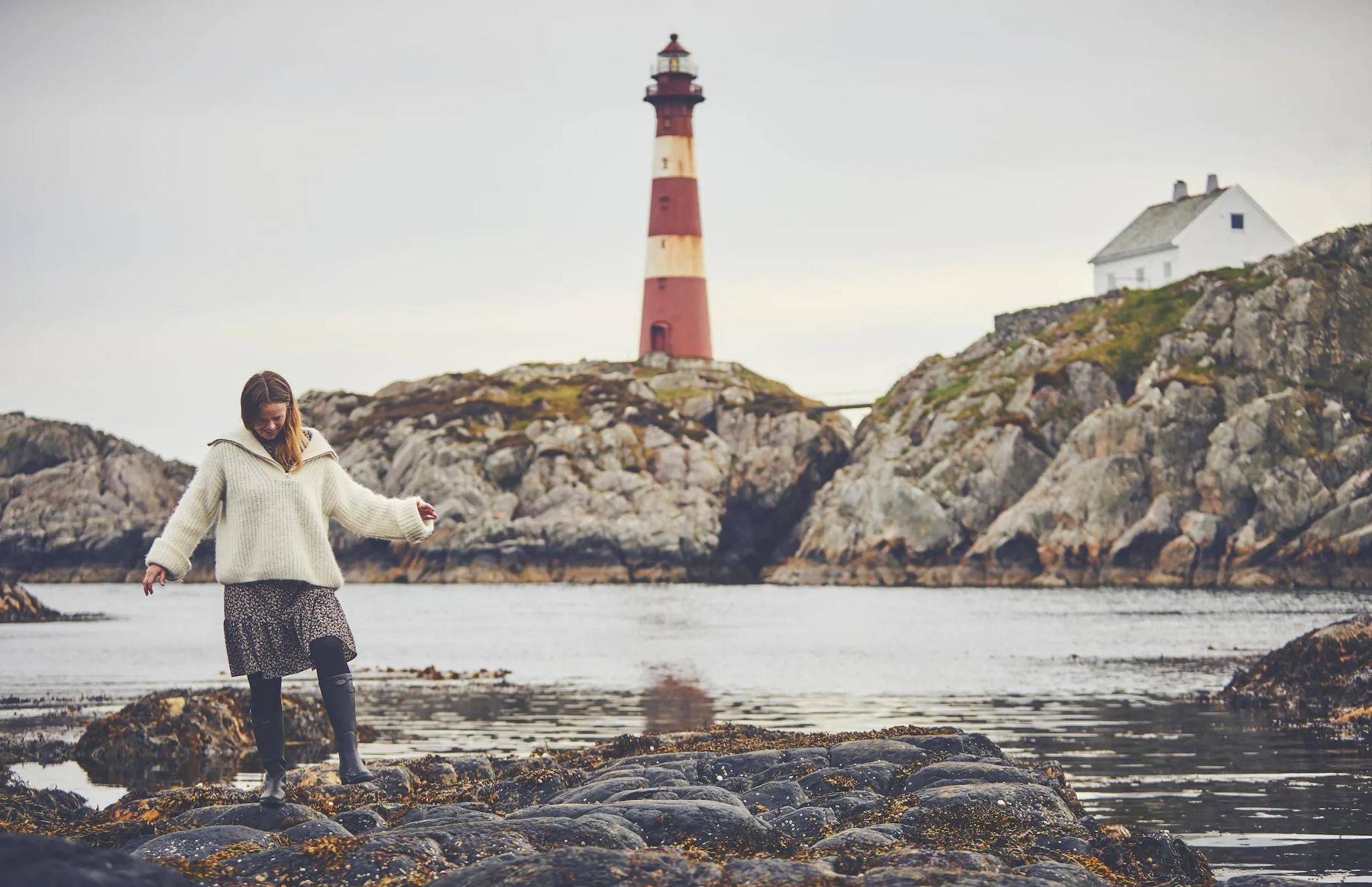 Women in front of lighthouse