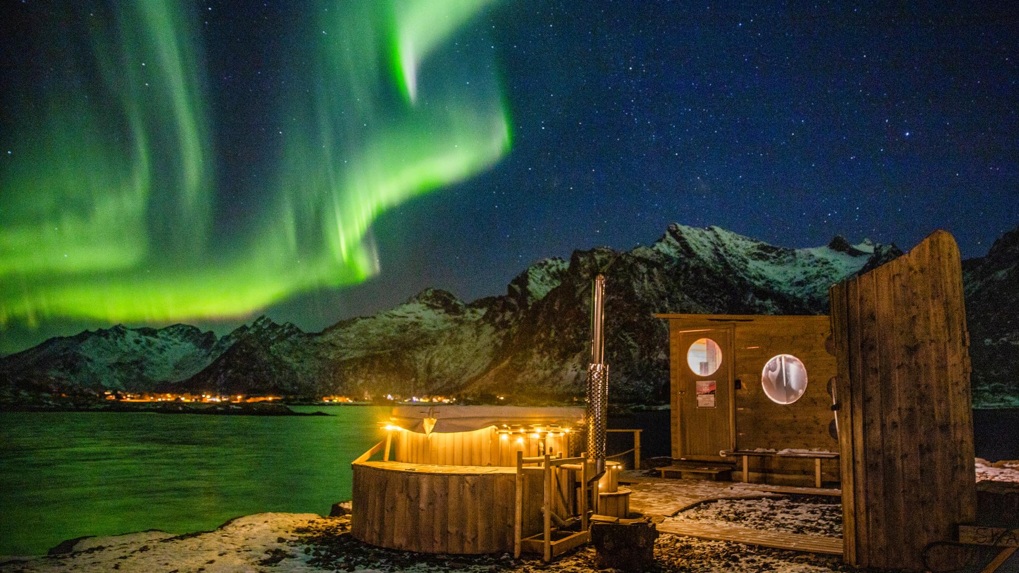 Skårungen sauna under the northern lights in Lofoten, Northern Norway