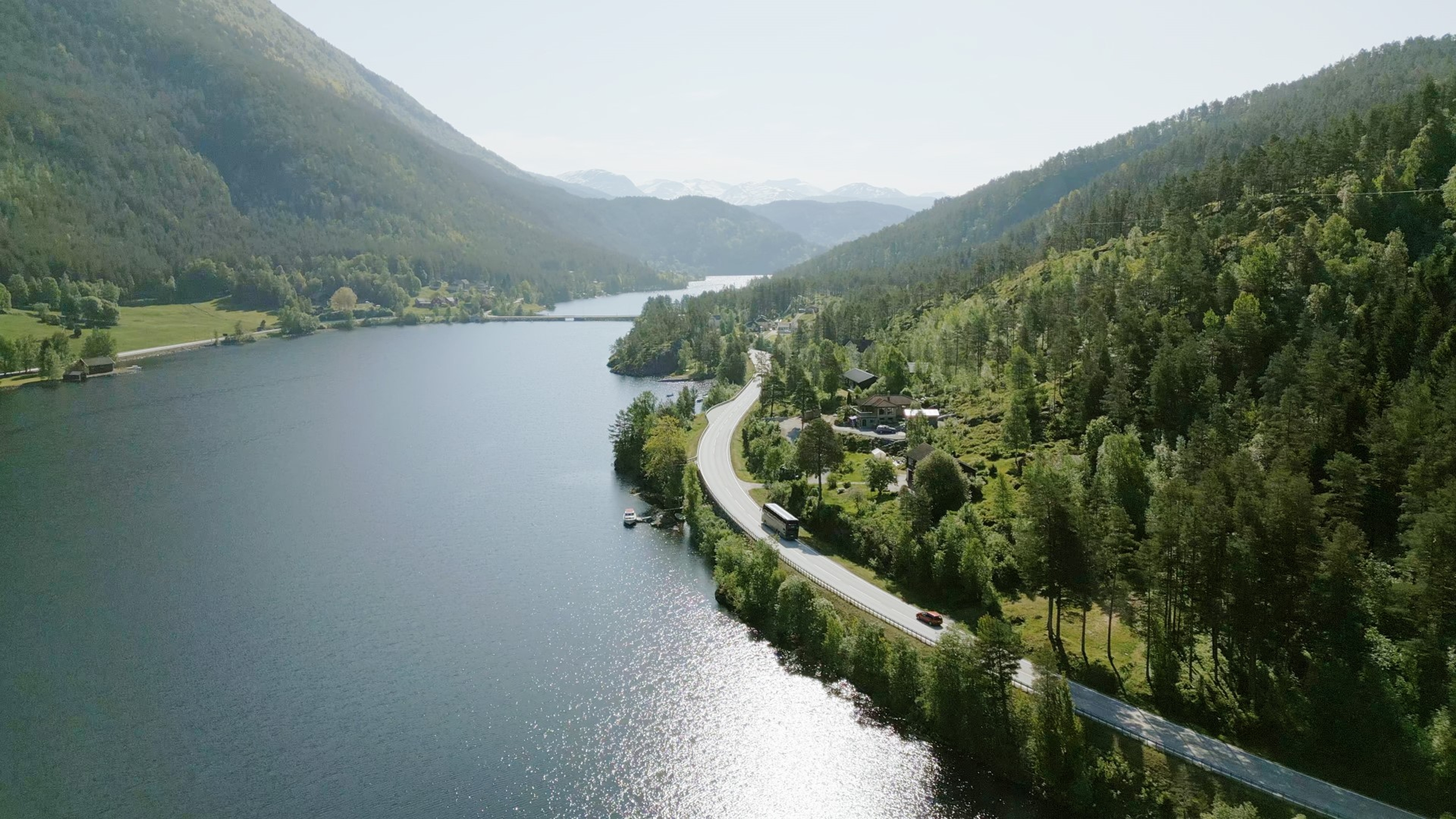 A bus driving along a fjord in Norway, Vy express route vy146