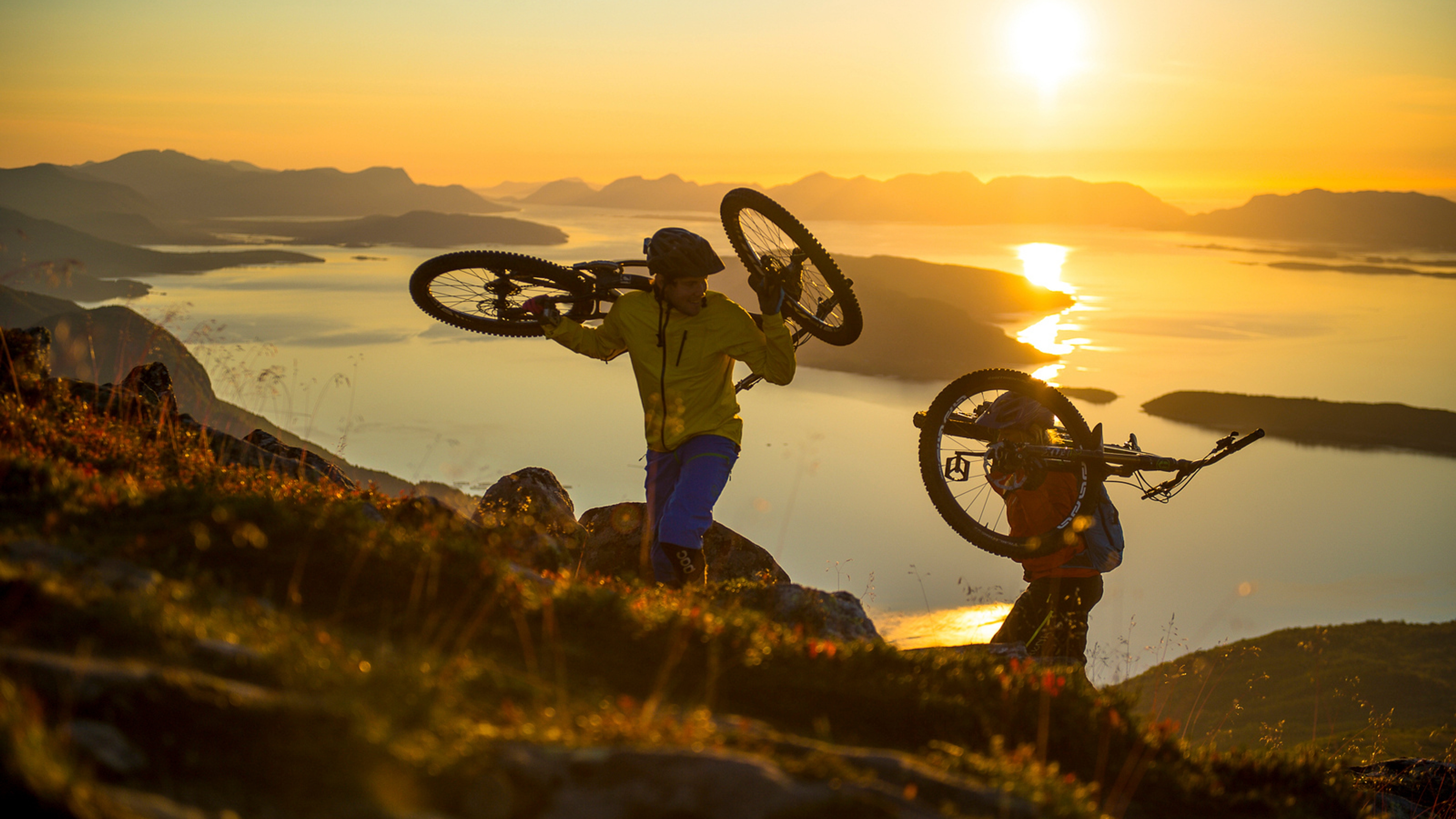 Two men biking in Romsdalen