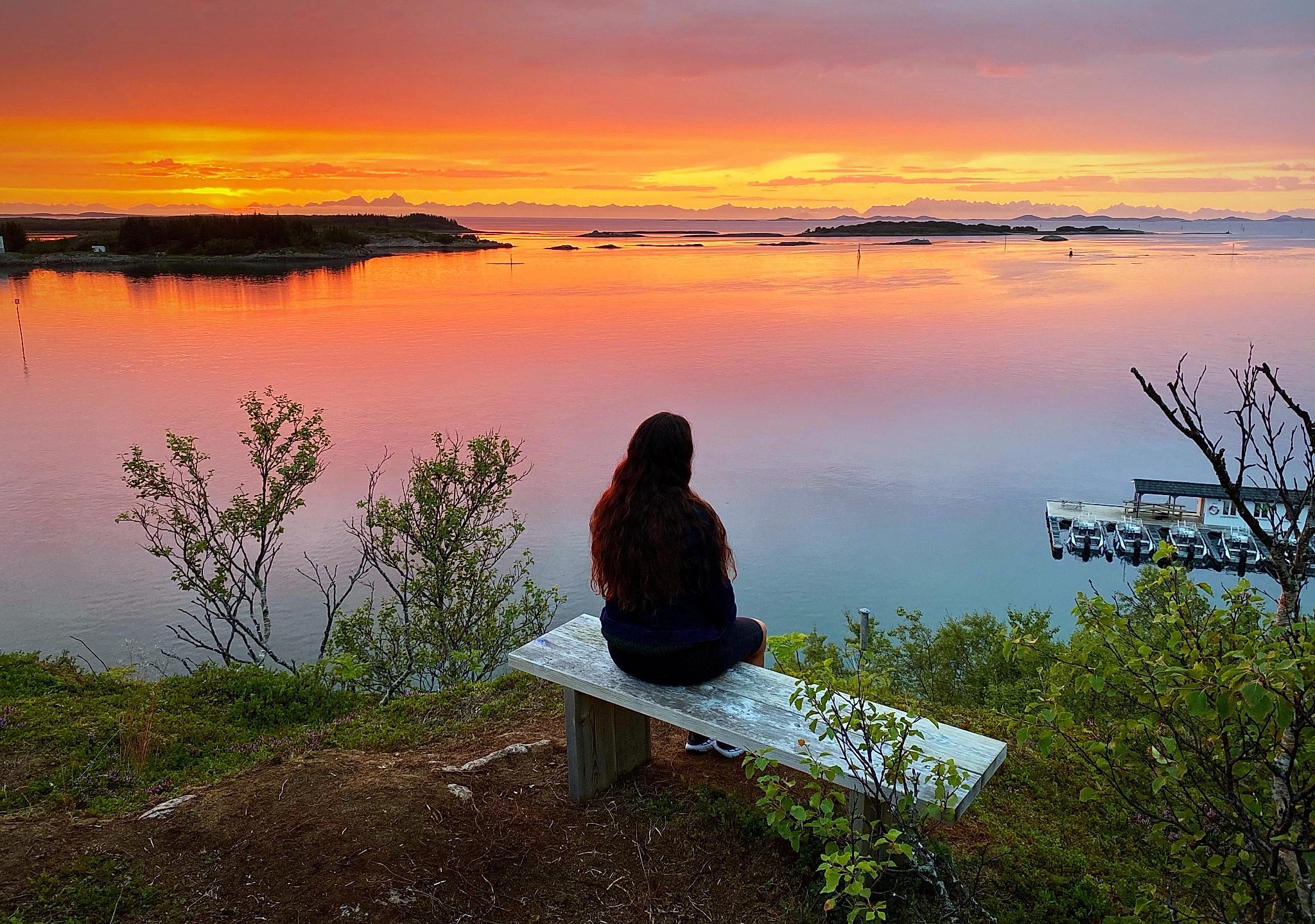 Sunset over sea and mountains