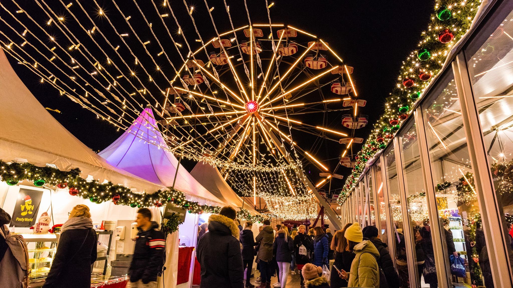Christmas market with Ferris wheel in Bergen, Fjord Norway