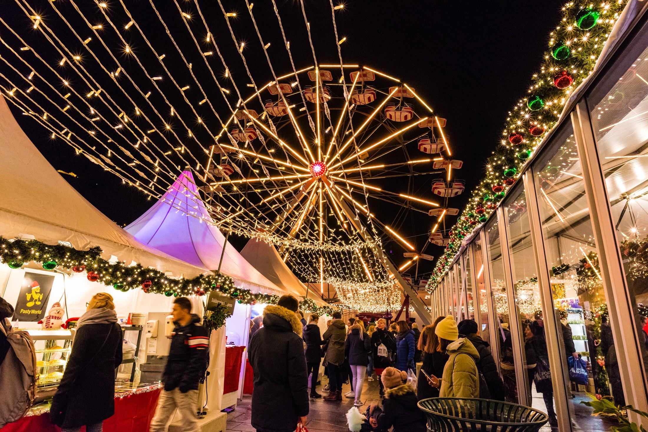 Christmas market with Ferris wheel in Bergen, Fjord Norway