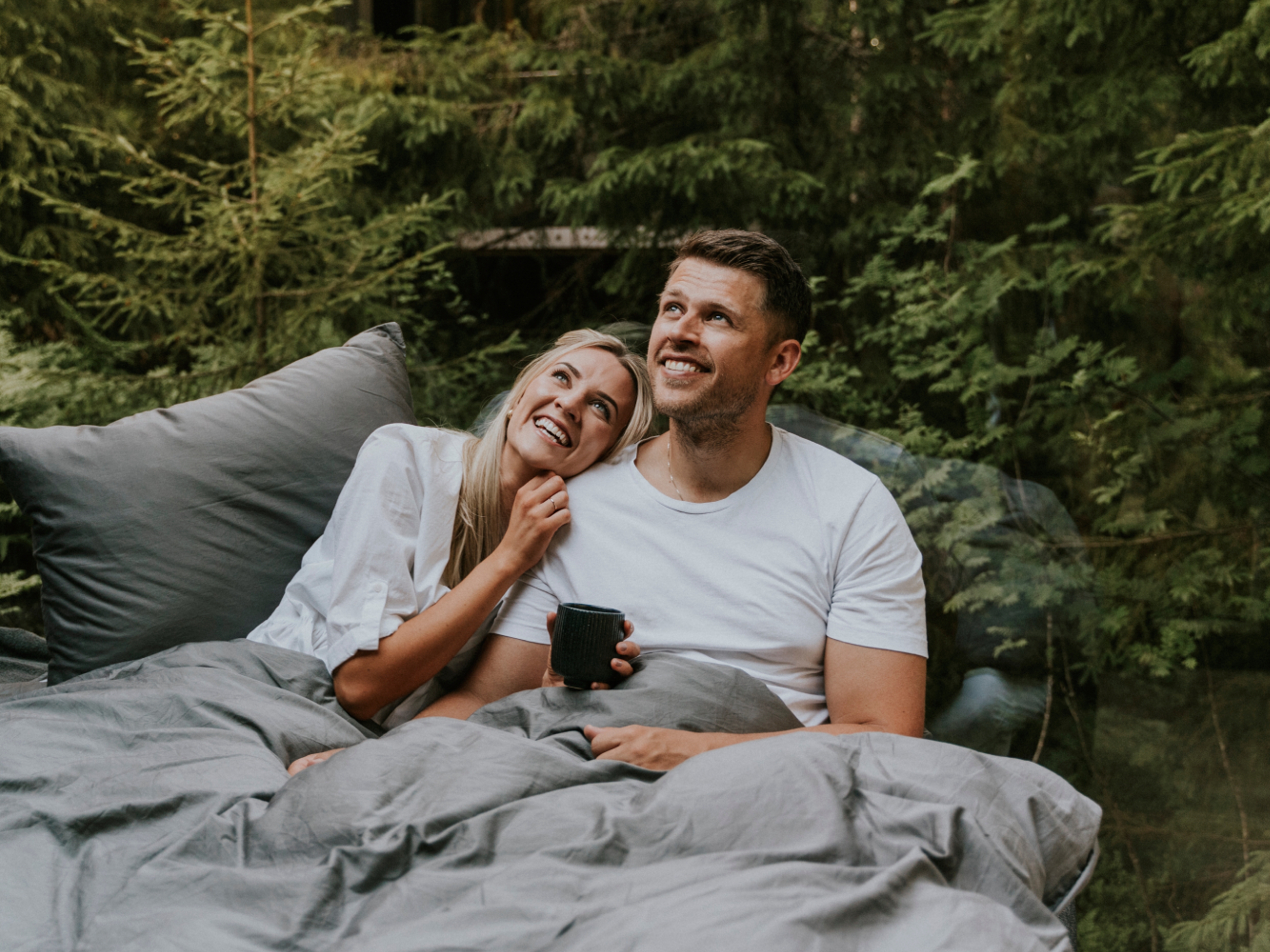 A man and a woman in bed at Laagen in Vestfold in Eastern Norway