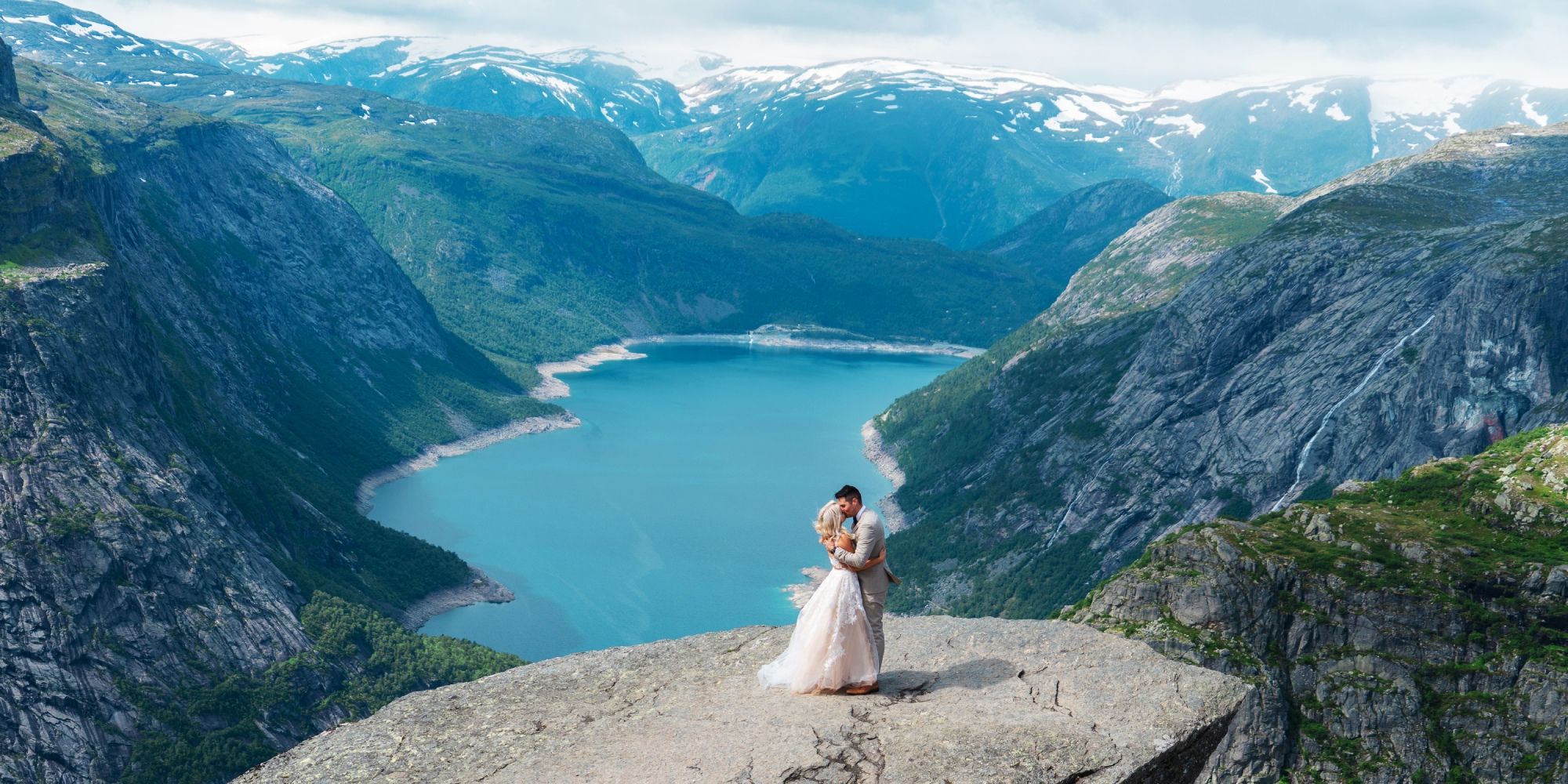 A couple getting married at Trolltunga in Ullensvang in Fjord Norway
