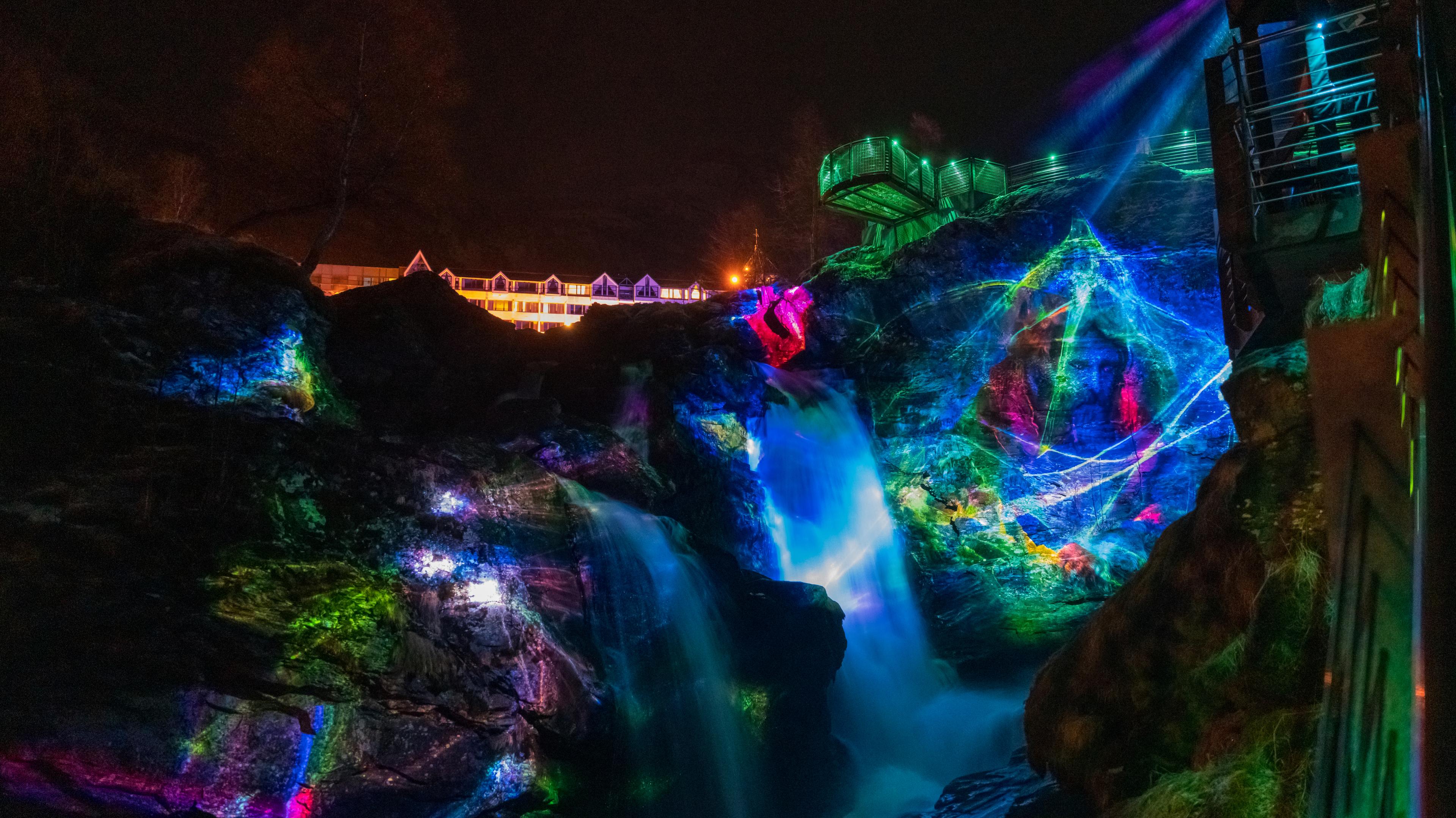 Lights over a waterfall at Geiranger light art festival