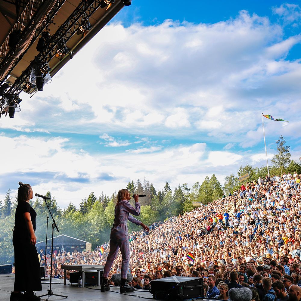 Musican performing in front of a large crowd at OsloOslo music festival at Grefsenkollen in Oslo, Eastern Norway