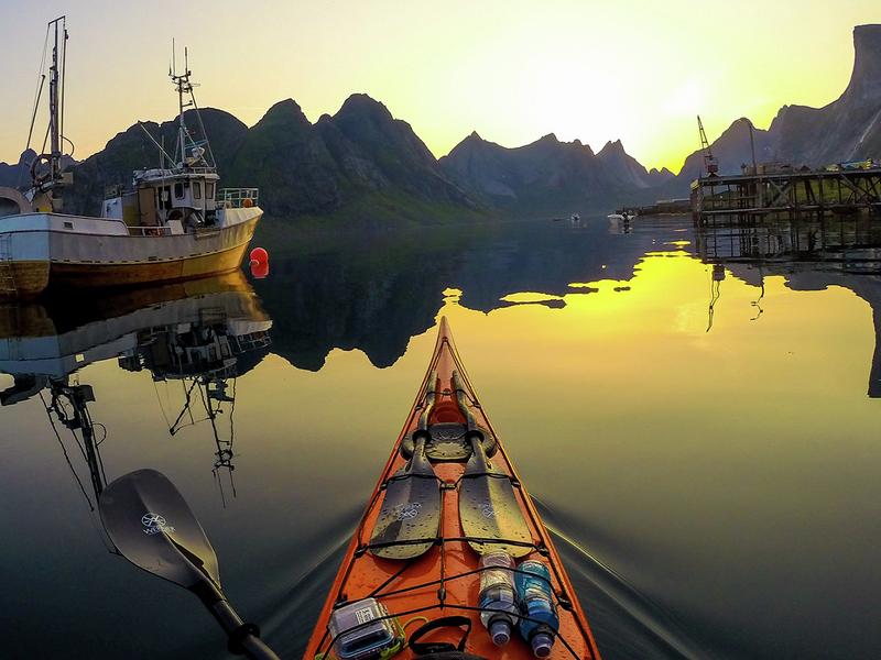 Kayaking into the midnight sun on Kjerkfjorden in Lofoten