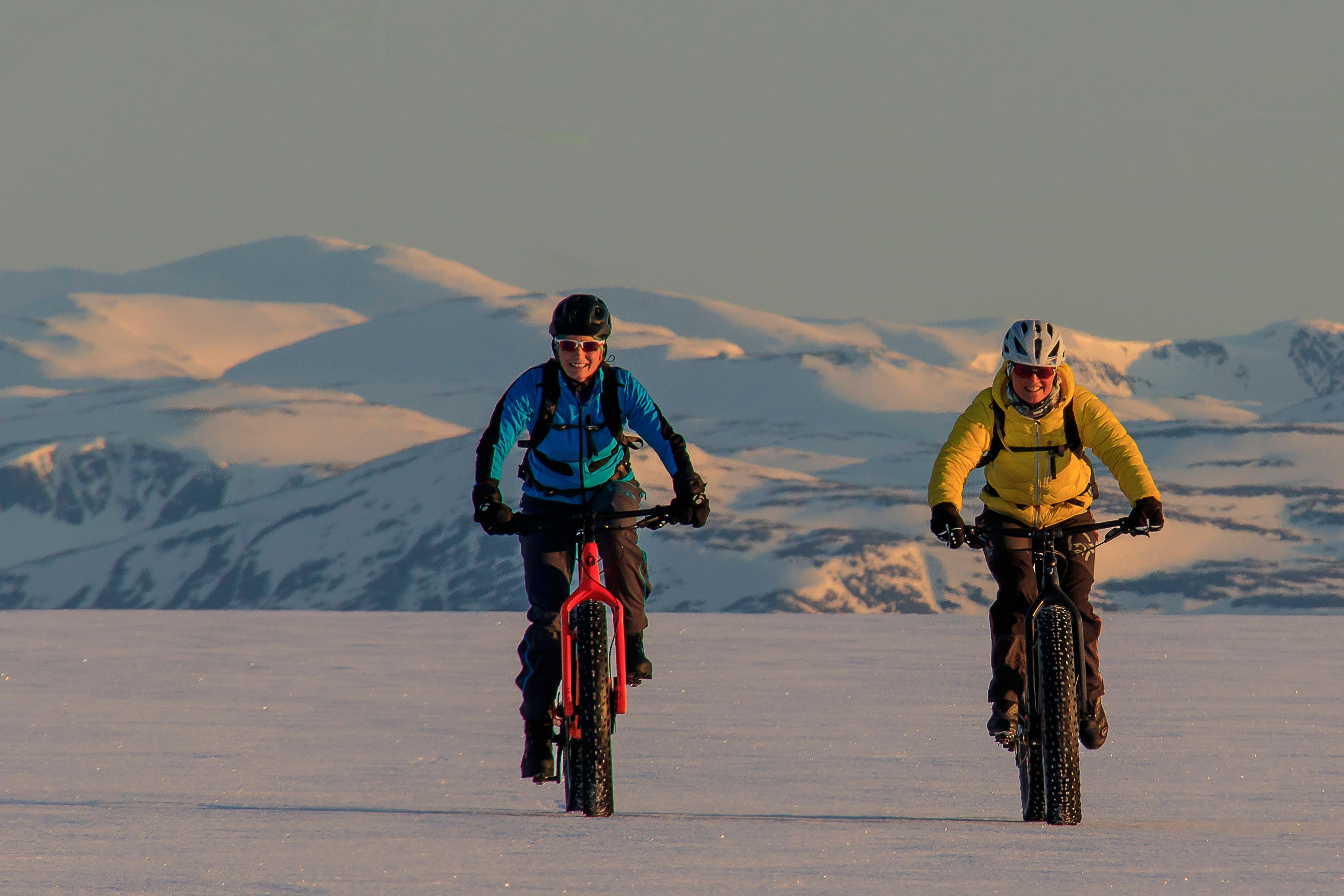 People fatbiking in Finnmark, Norway.