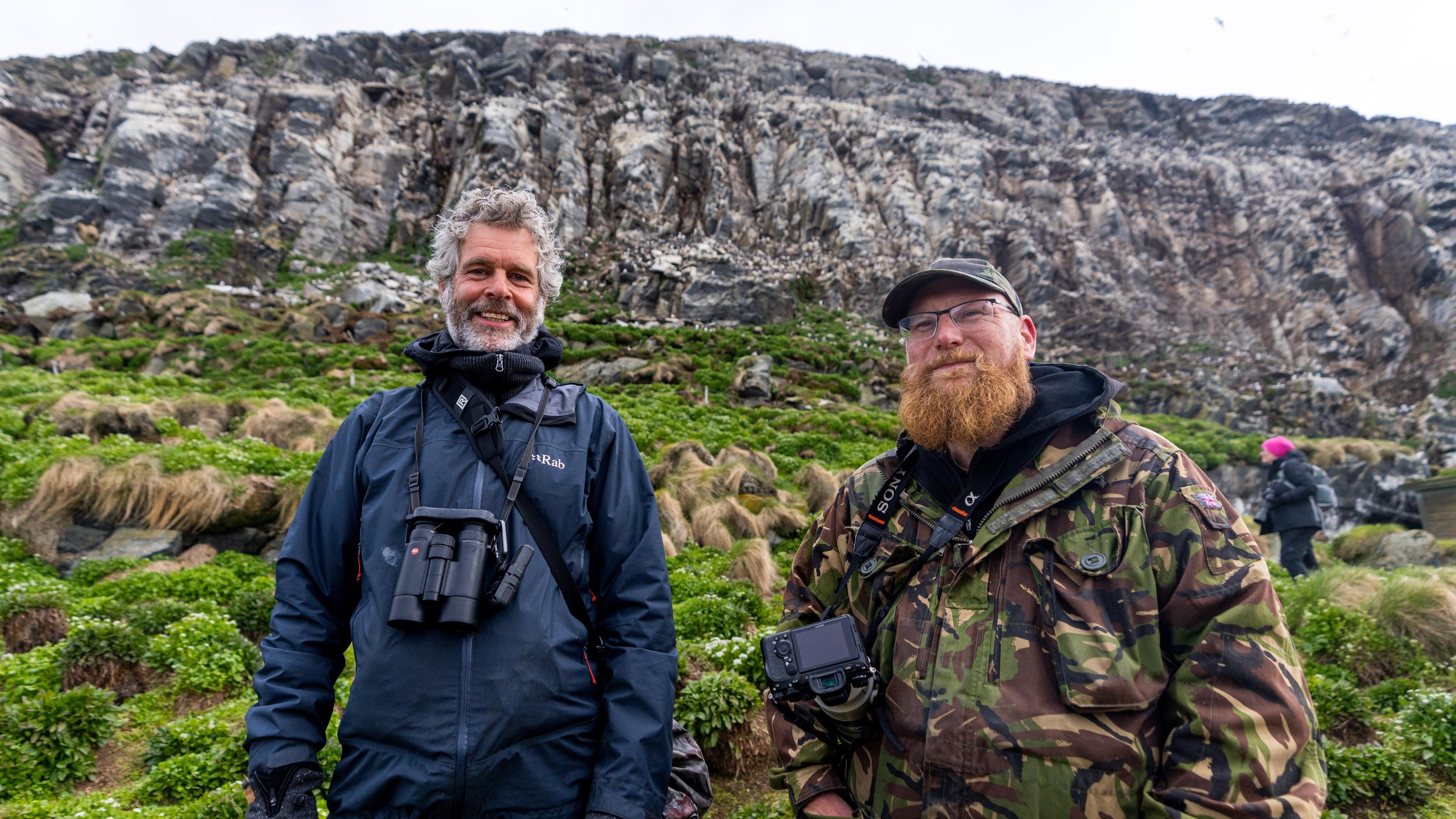 Two birdwatcher tourists at Hornøya in Varanager, Northern Norway