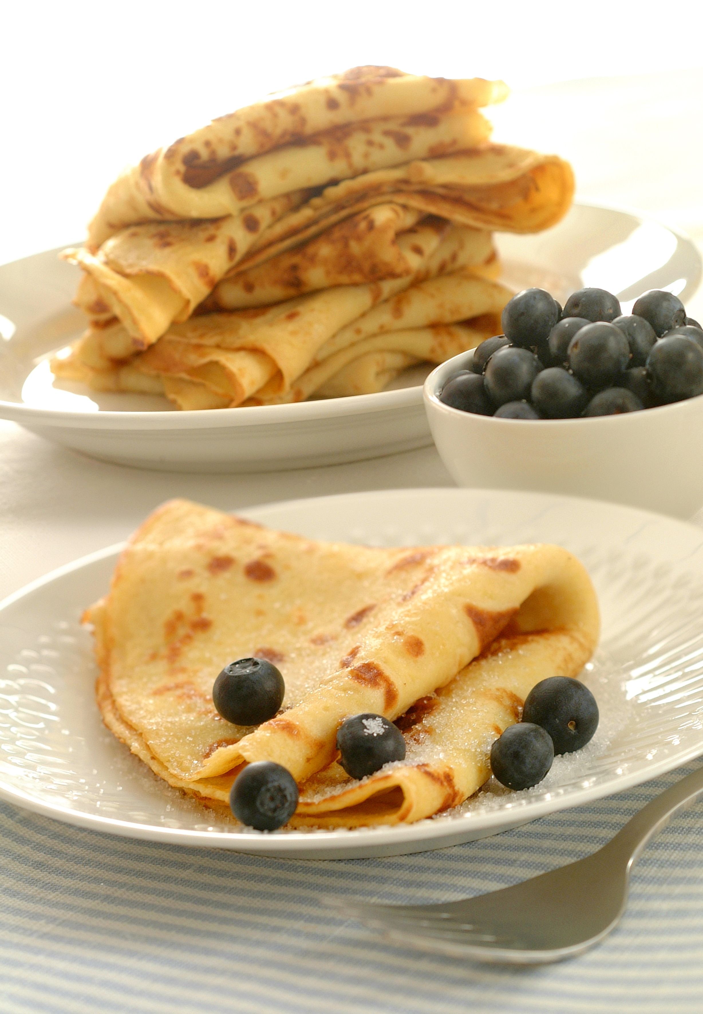 Sevaral Norwegian pancakes with blueberry