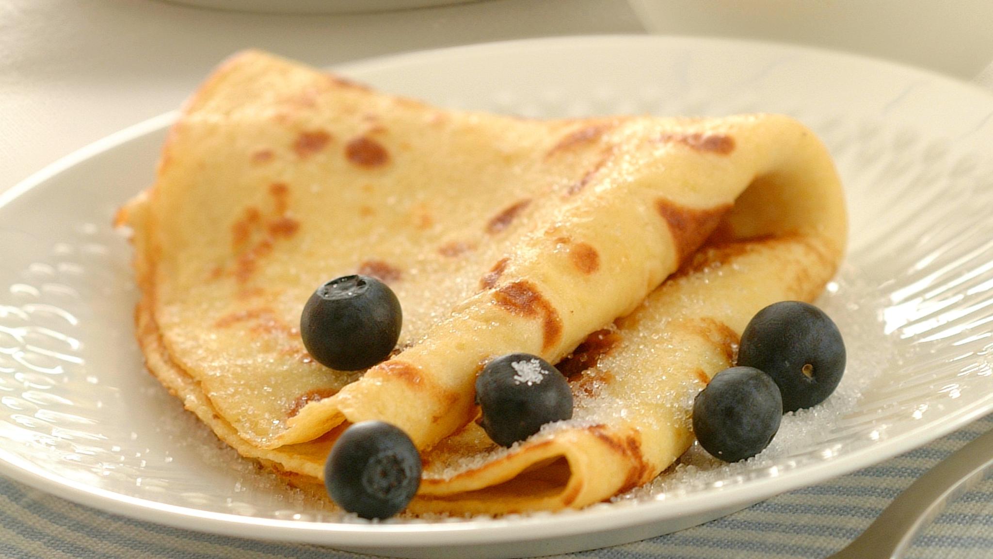 Sevaral Norwegian pancakes with blueberry