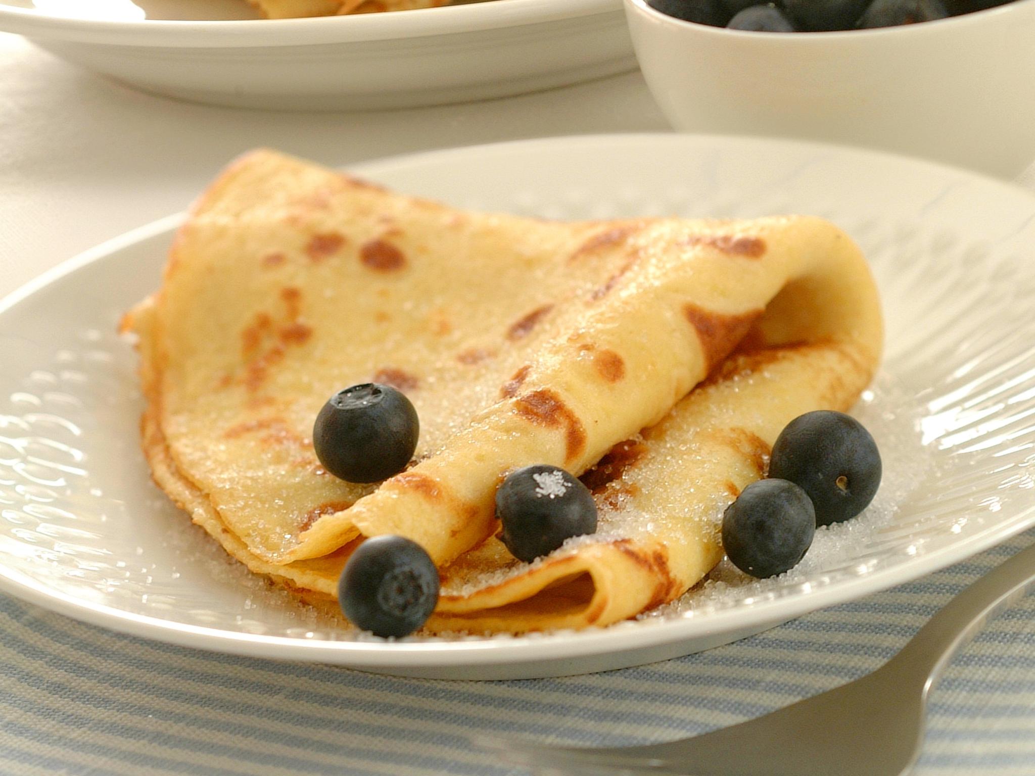 Sevaral Norwegian pancakes with blueberry