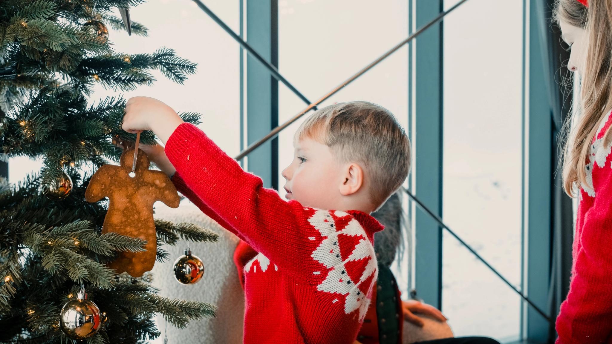 Santa and the children decorating the Christmas tree at Mount Ulriken