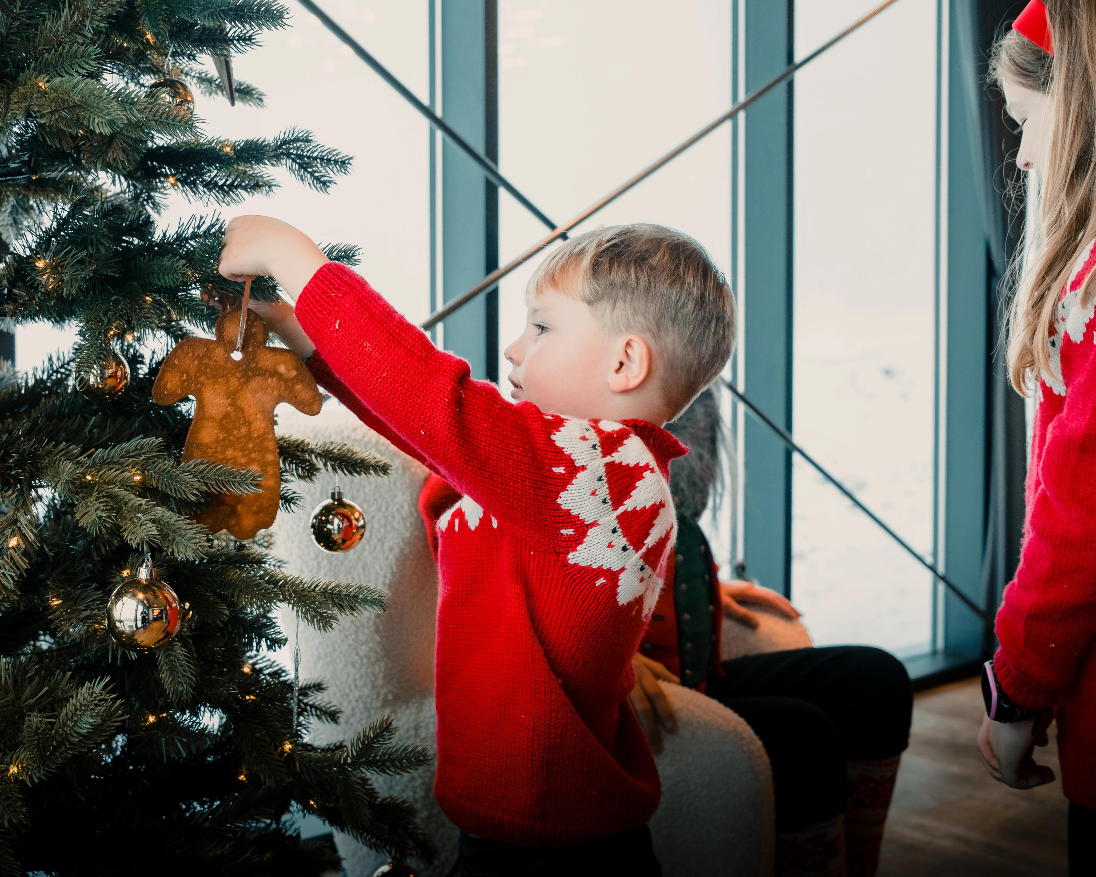 Santa and the children decorating the Christmas tree at Mount Ulriken