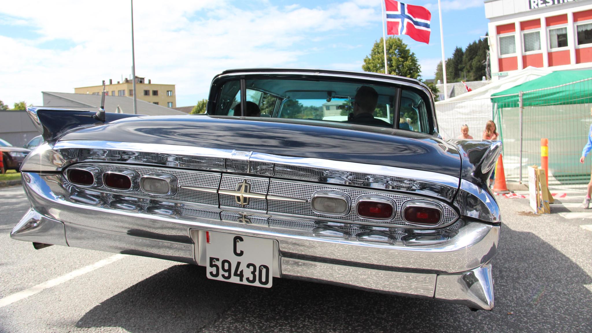 Closeup of the backlights of a black, classic American car at the American festival in Farsund, Southern Norway.