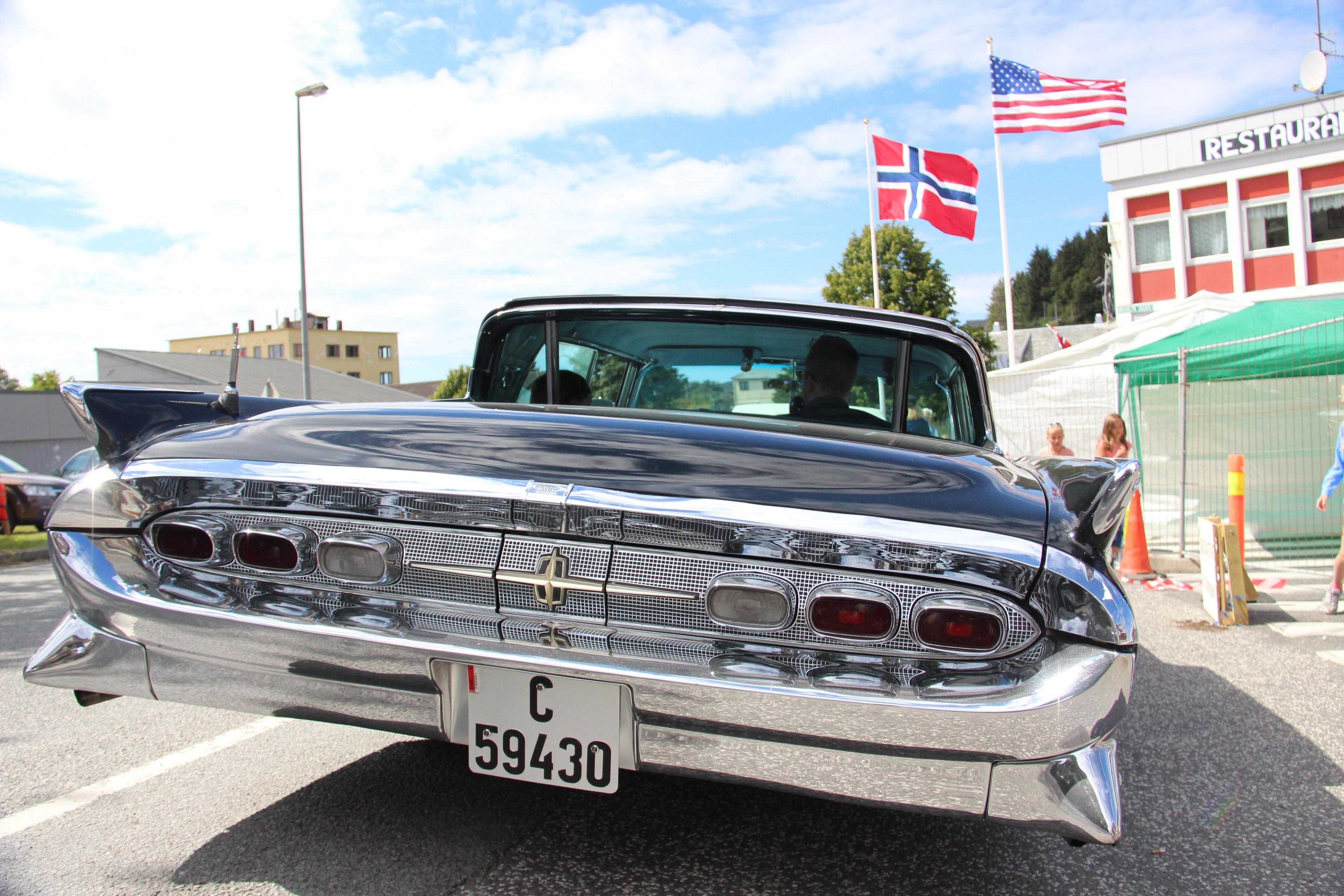 Closeup of the backlights of a black, classic American car at the American festival in Farsund, Southern Norway.