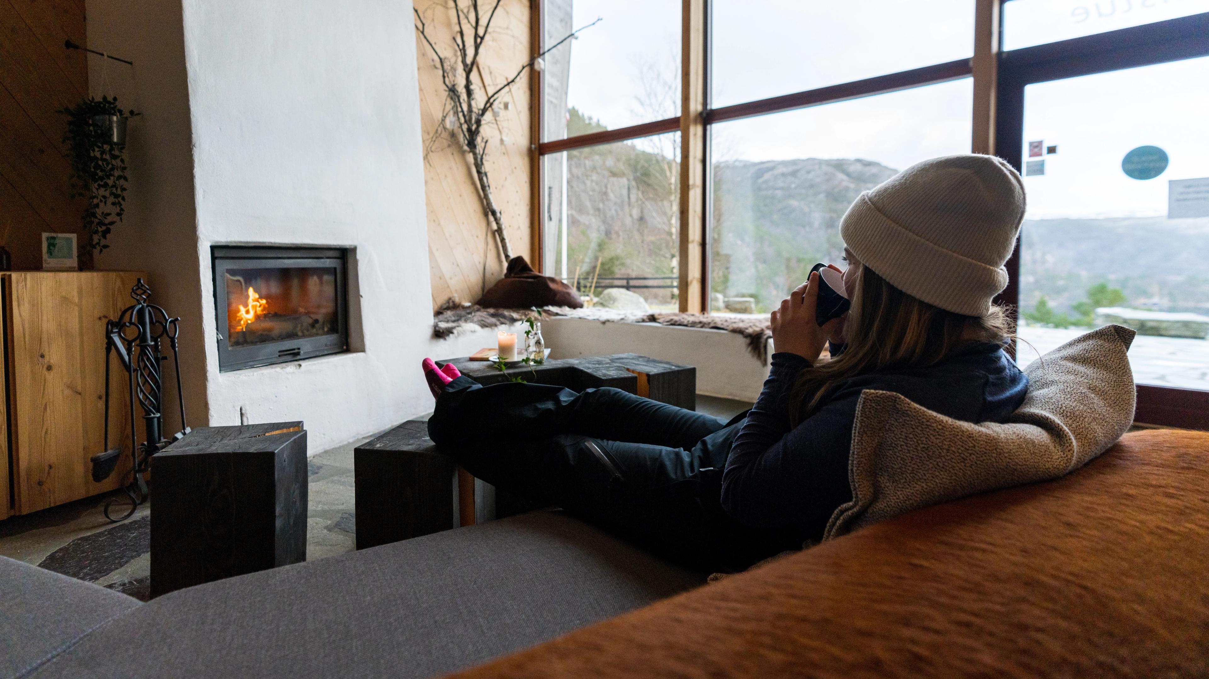 Cozy fireplace at Preikestolen Fjellstue in Ryfylke