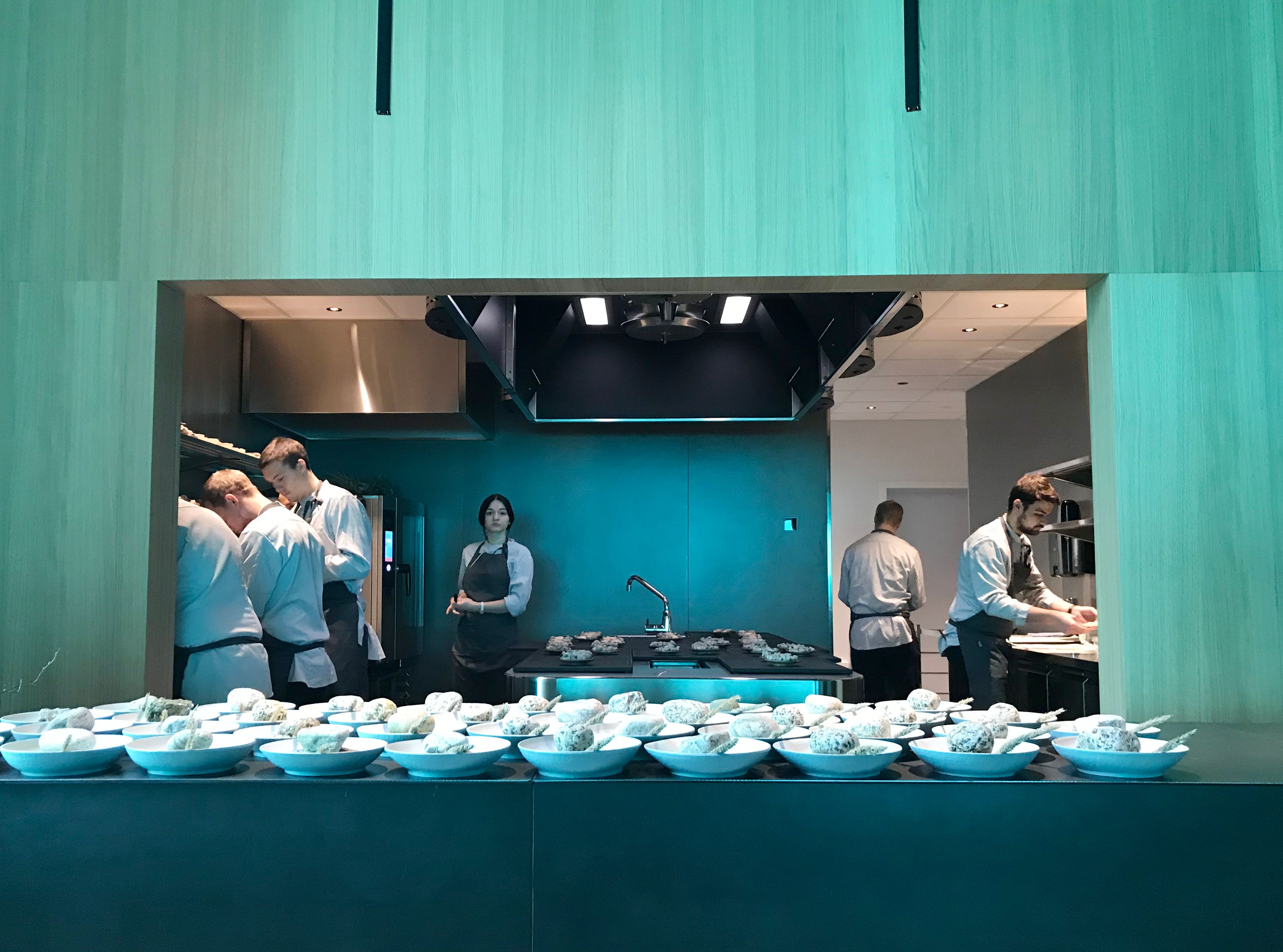 View of the kitchen and meal preparations in the underwater restaurant Under in Lindesnes, Southern Norway