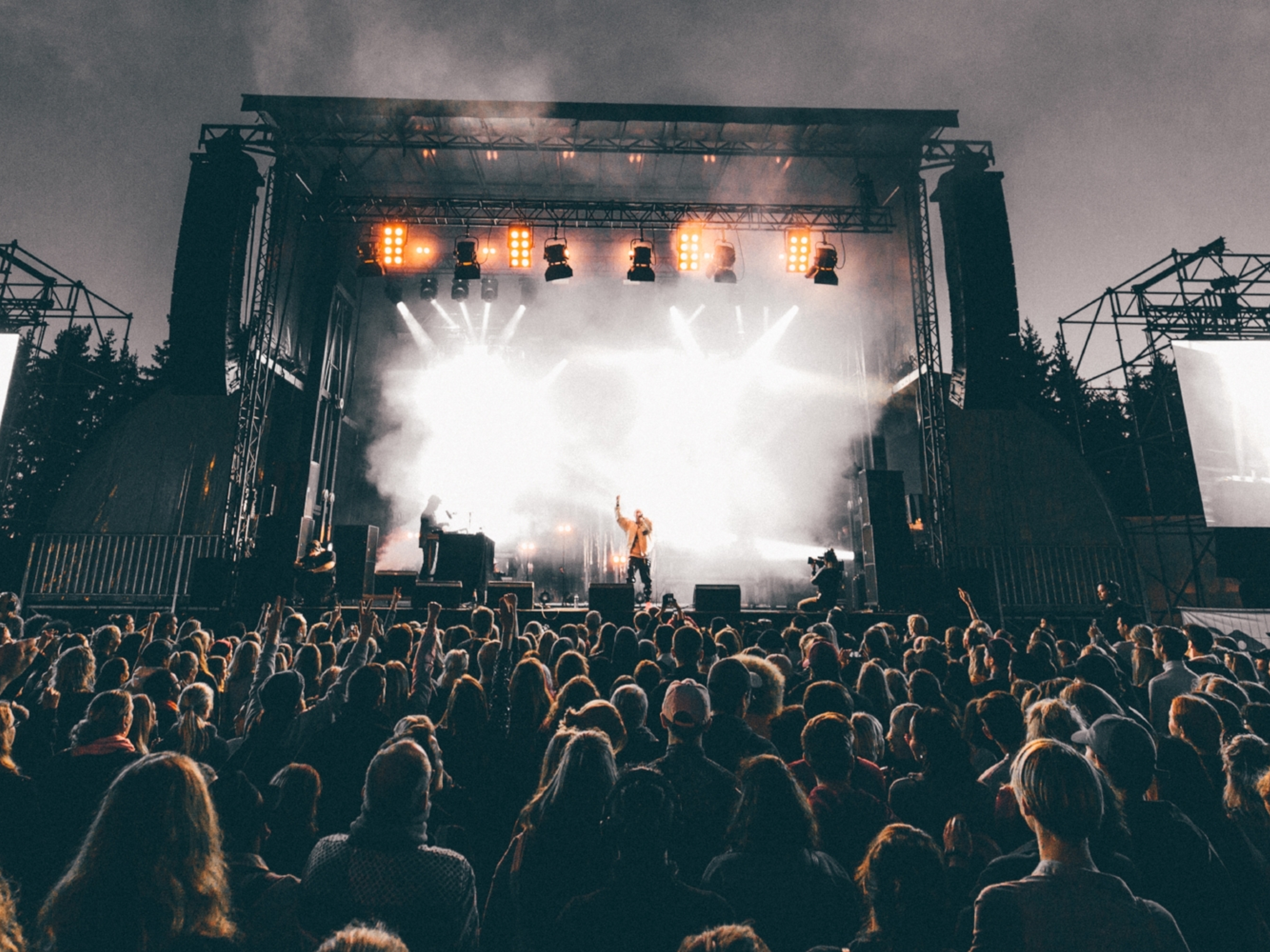 A band performing in front of a big audience at Granittrock festival in Oslo