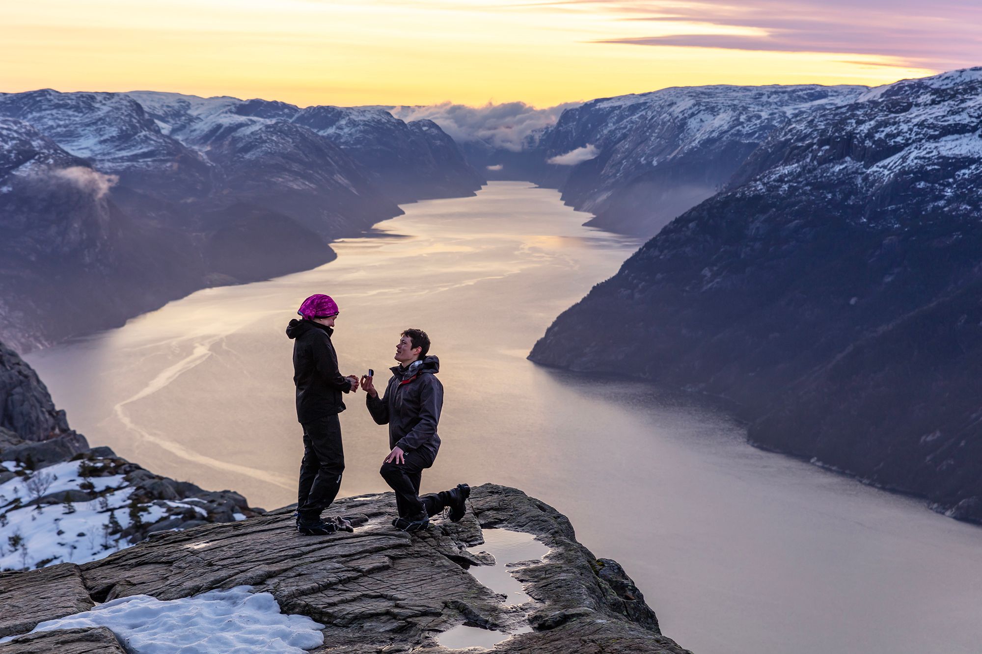 Man proposing to woman at Preikestolen mountain