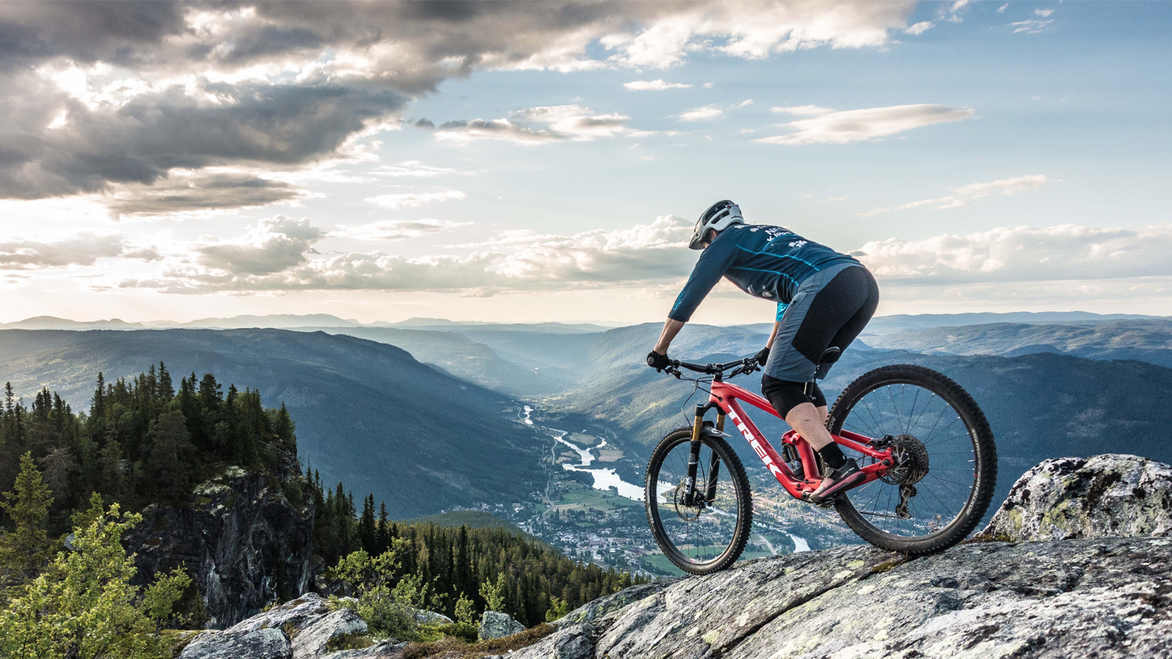 Mountain biking in Hallingdal: A person mountain biking on Mount Beia near Nesbyen in Eastern Norway