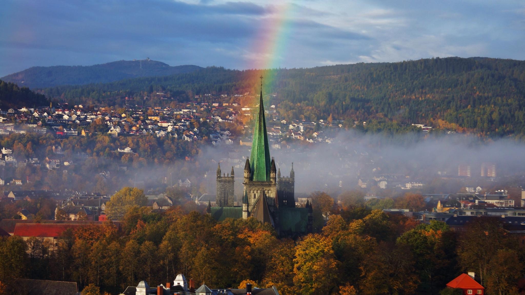 Bird's-eye view on the Nidaros Cathedral and a rainbow in Trondheim, Trøndelag, Norway
