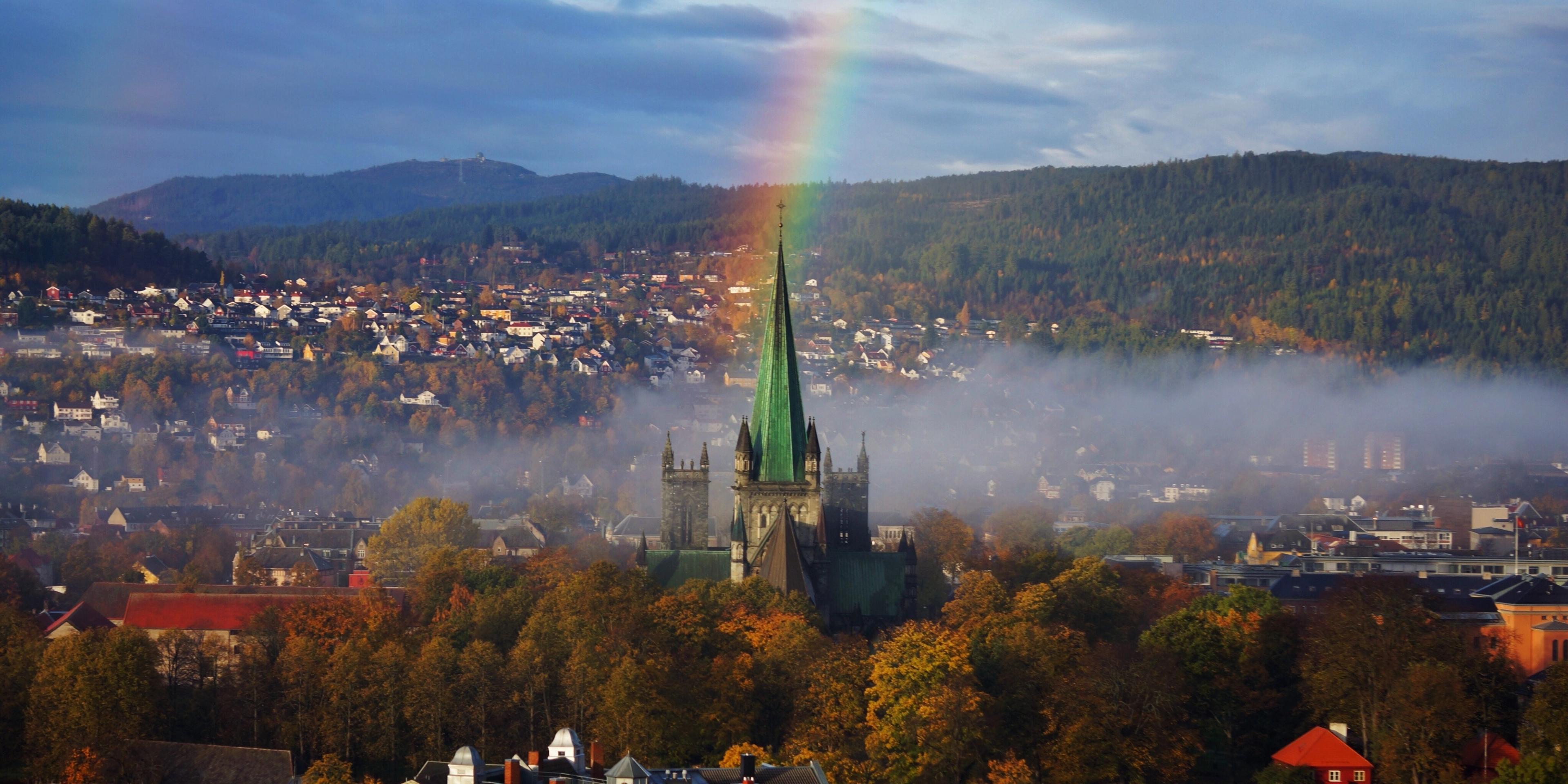 Bird's-eye view on the Nidaros Cathedral and a rainbow in Trondheim, Trøndelag, Norway