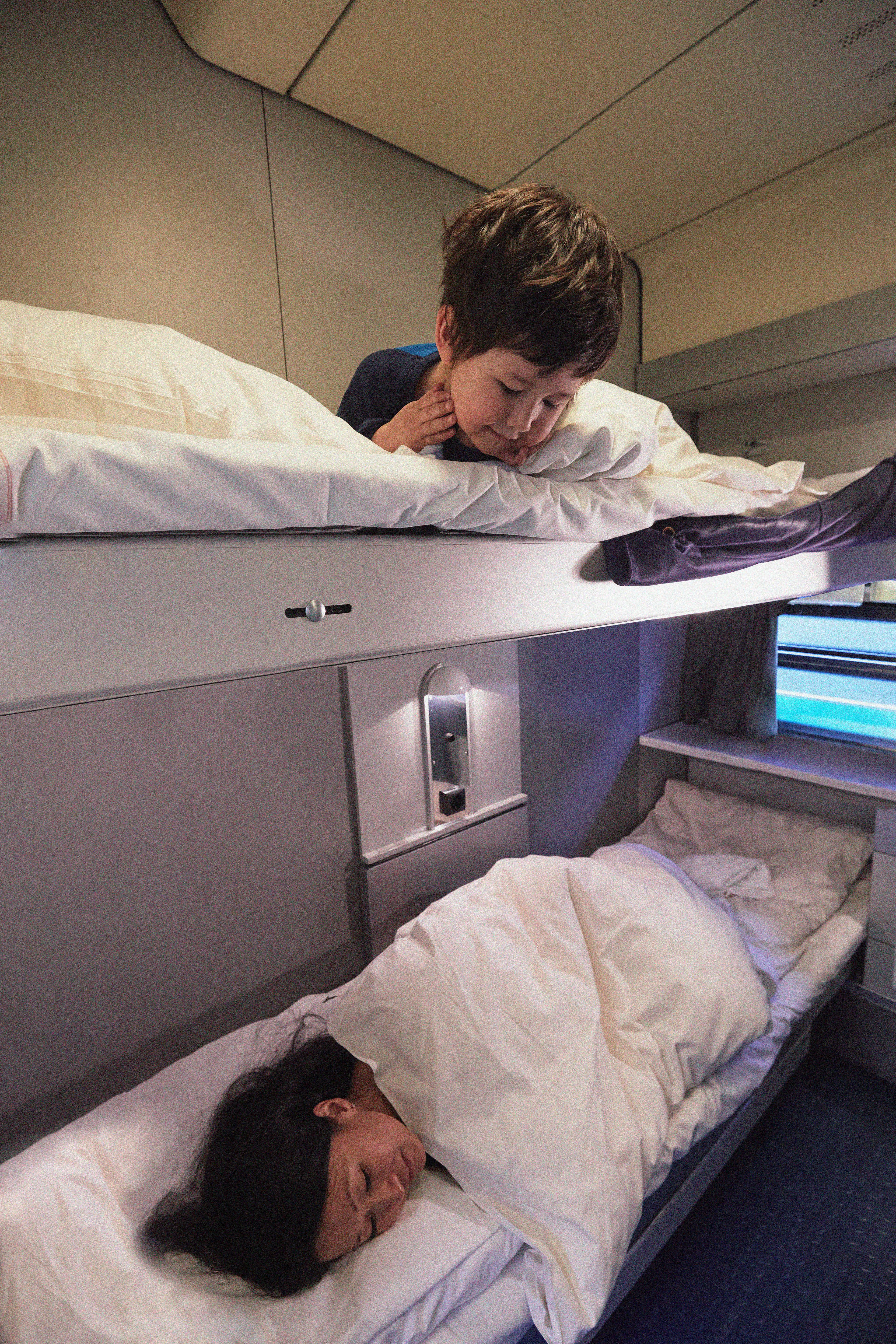 Kid sleeping in the train