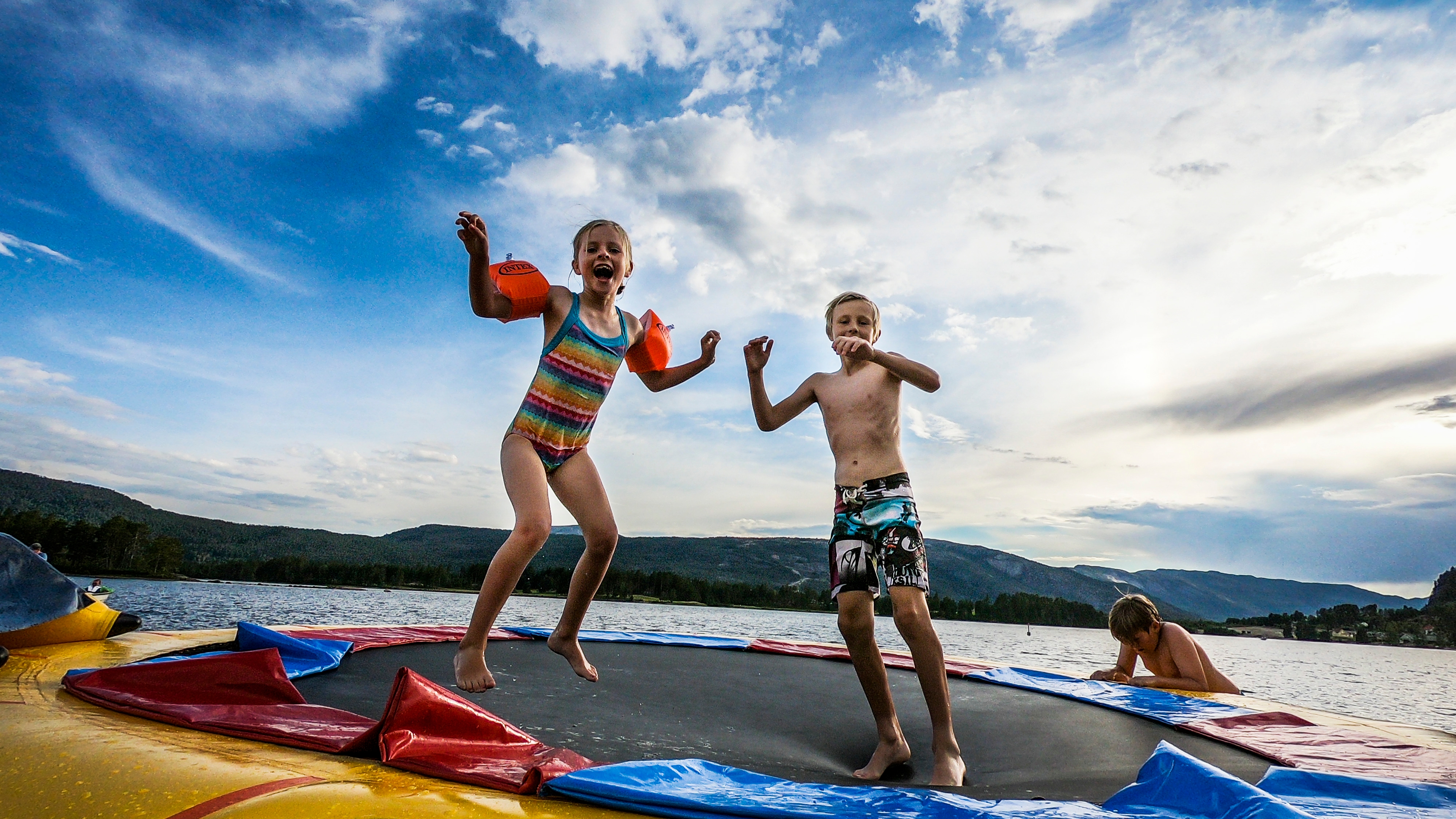 Kids playing in the water by Vrådal in Eastern Norway