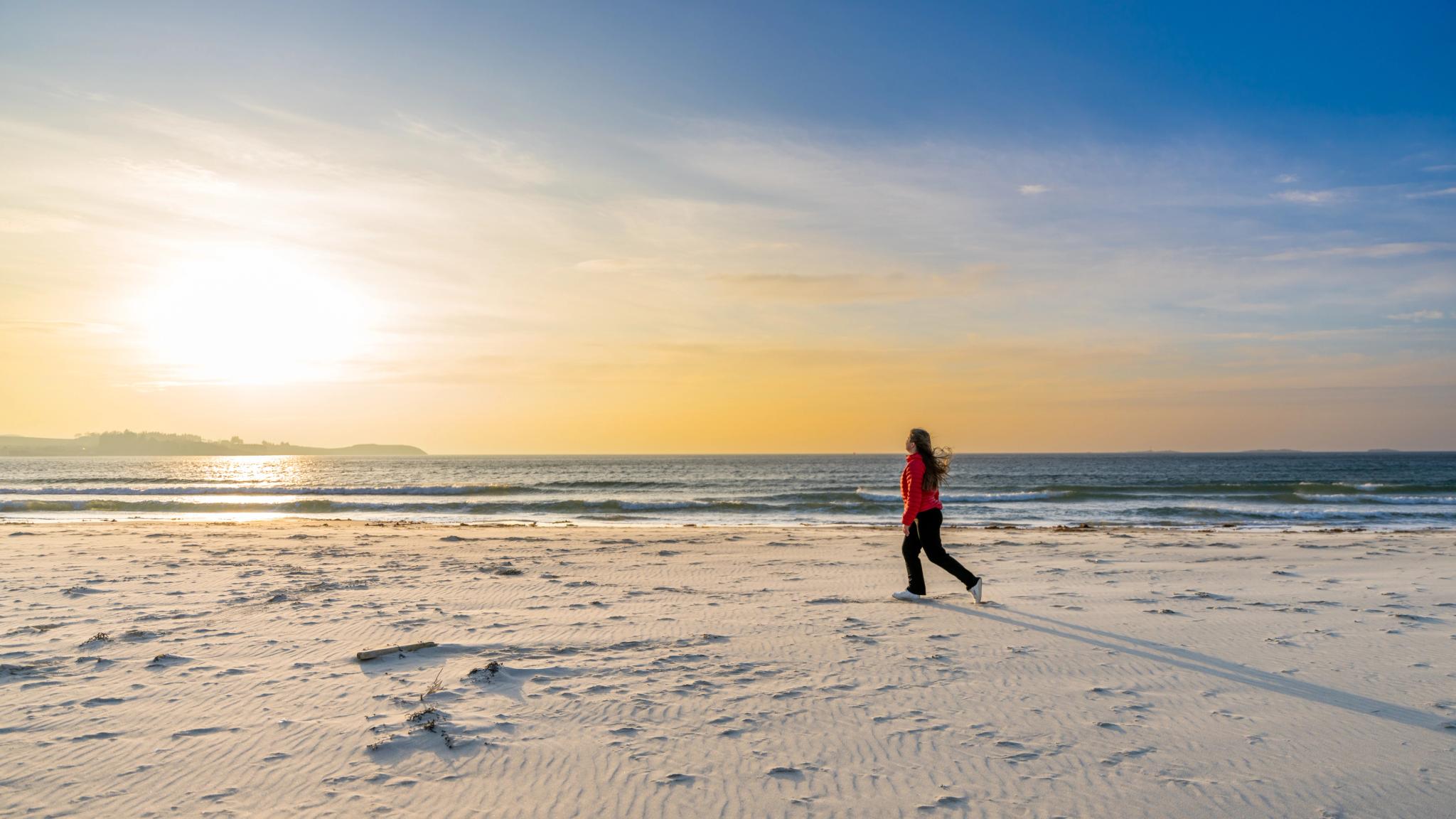 Walking into the sunset at Solastranden, Sola Beach, Stavanger