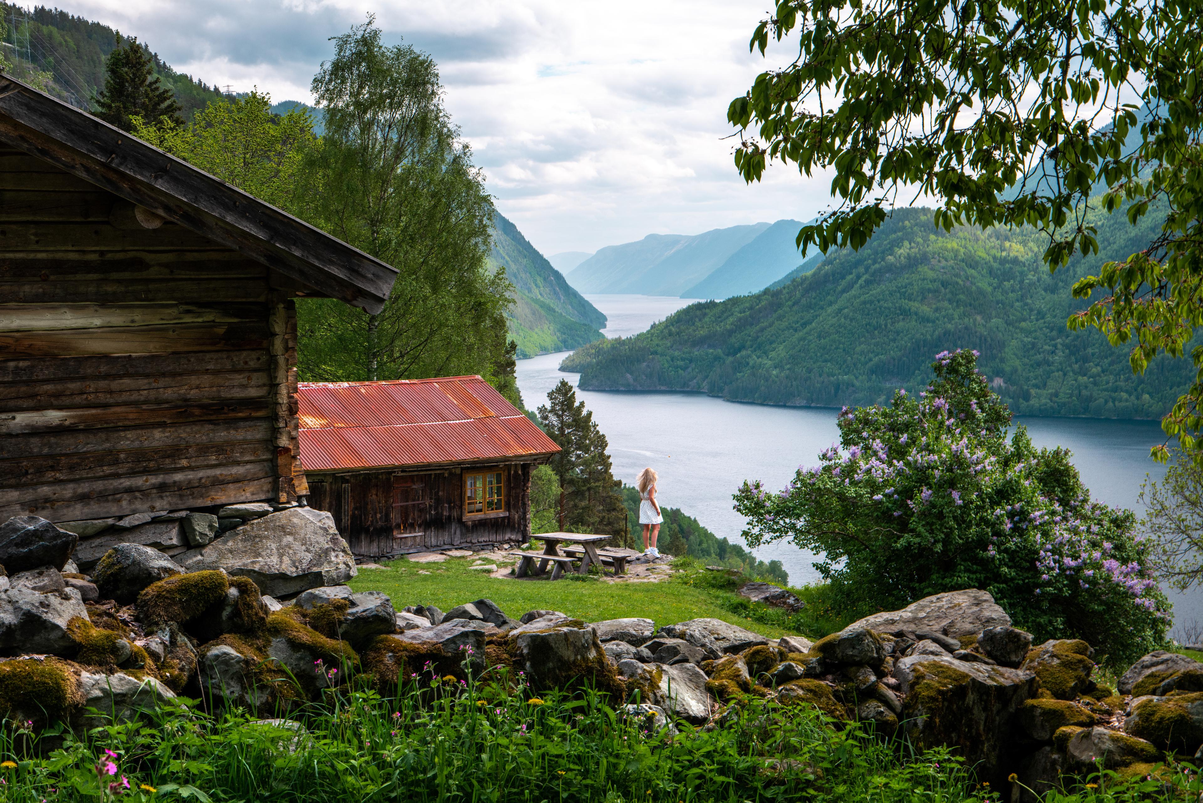 Girl enjoying the view from the Rui Farm, in Dalen, Telemark