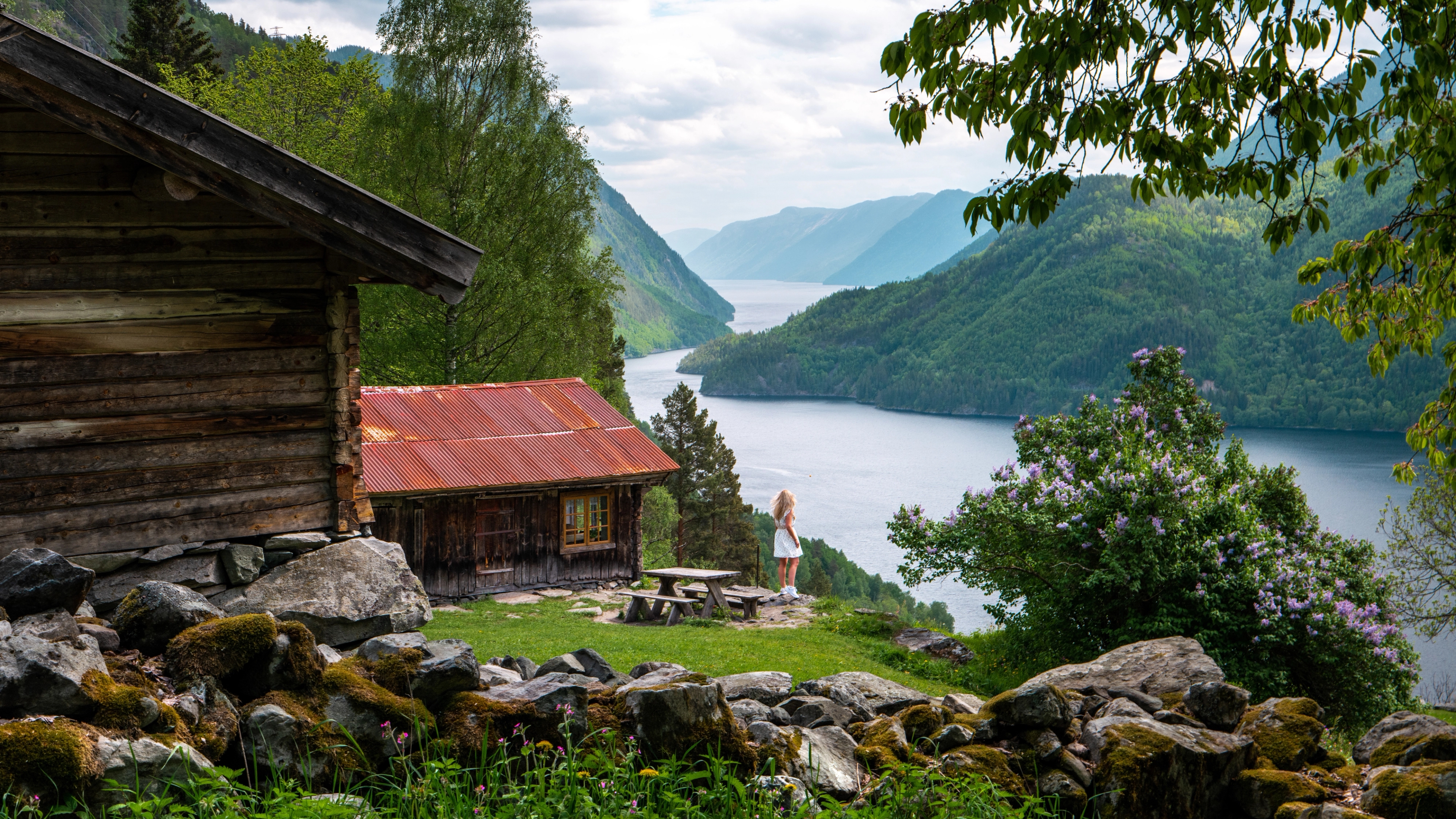 Girl enjoying the view from the Rui Farm, in Dalen, Telemark