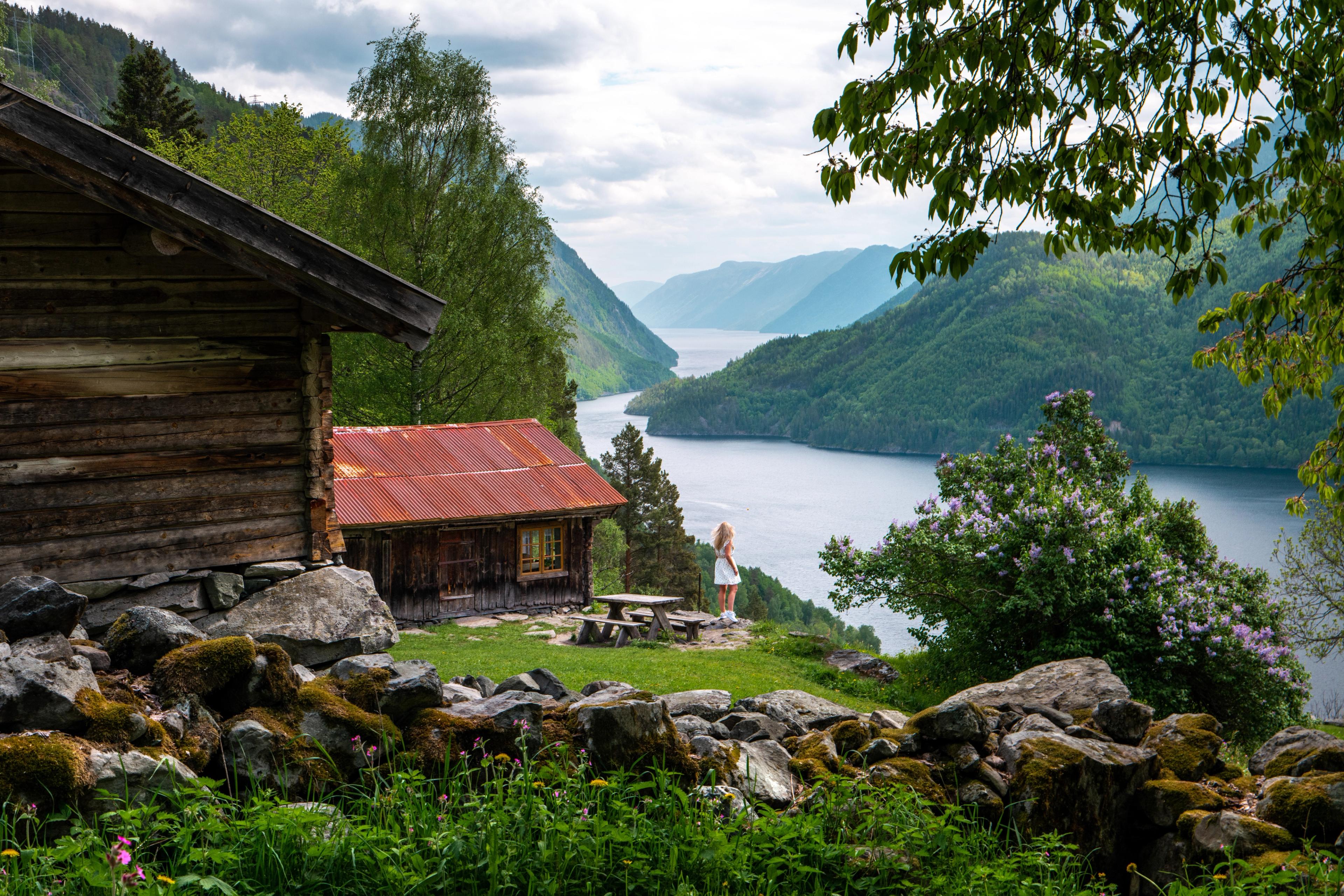 Girl enjoying the view from the Rui Farm, in Dalen, Telemark