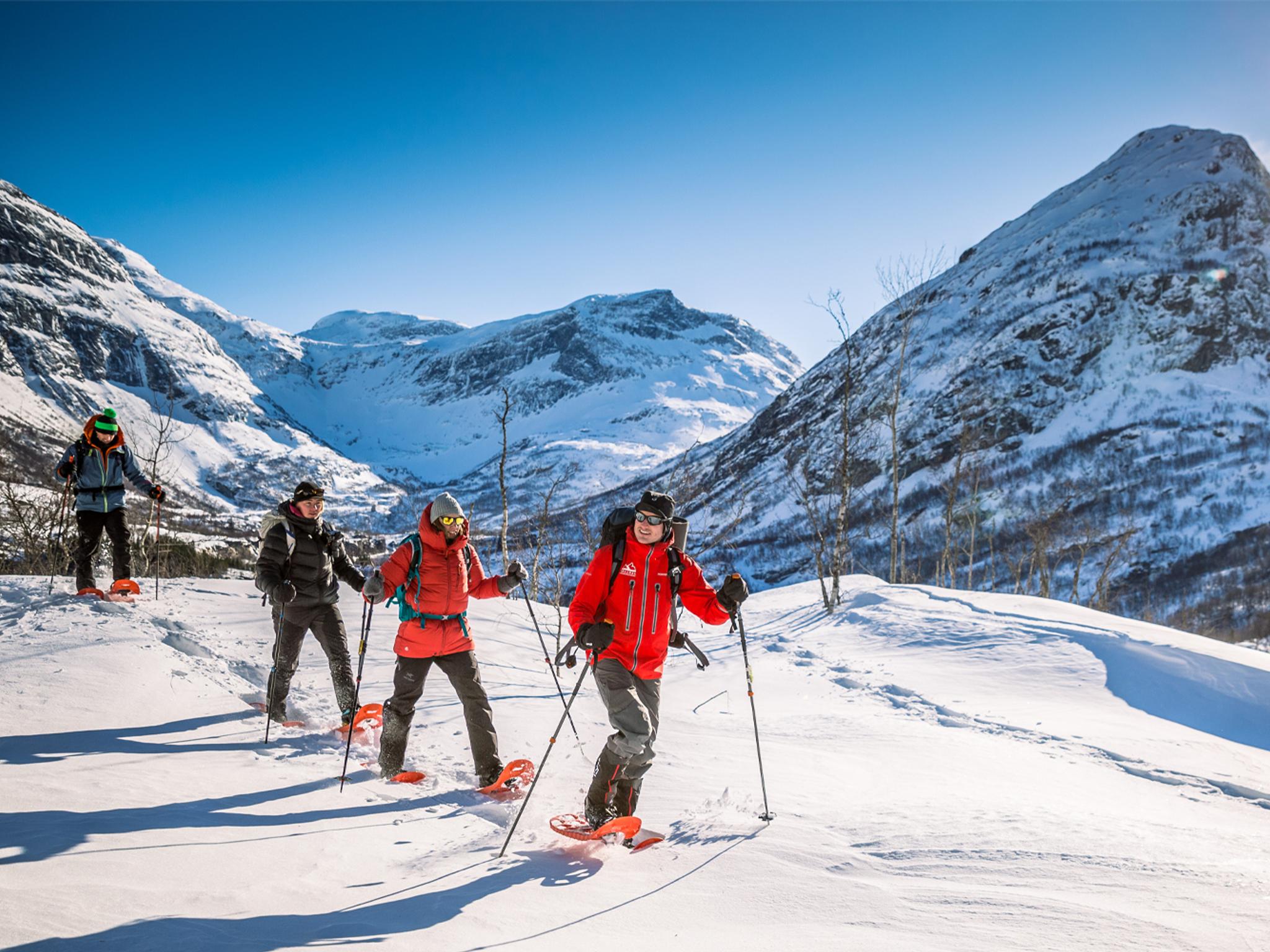 People snowshoeing in Møre og Romsdal, Fjord Norway