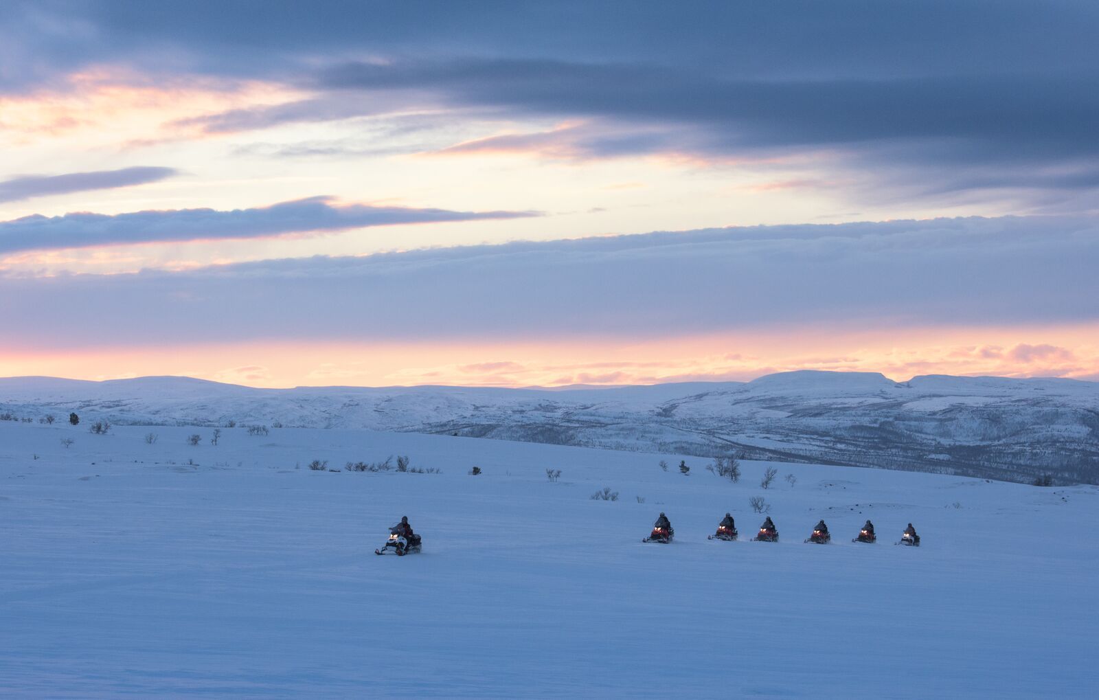 Snowscooters on the Alta river and Finmarksvidda