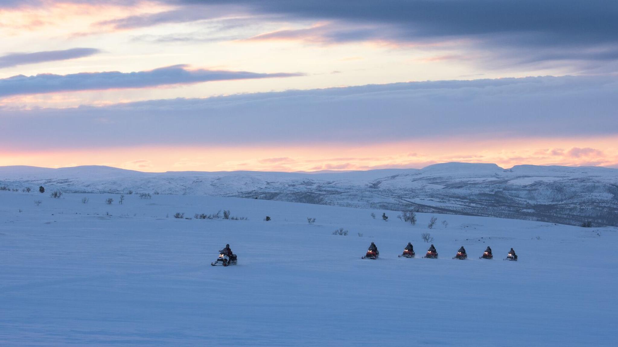 Snowscooters on the Alta river and Finmarksvidda
