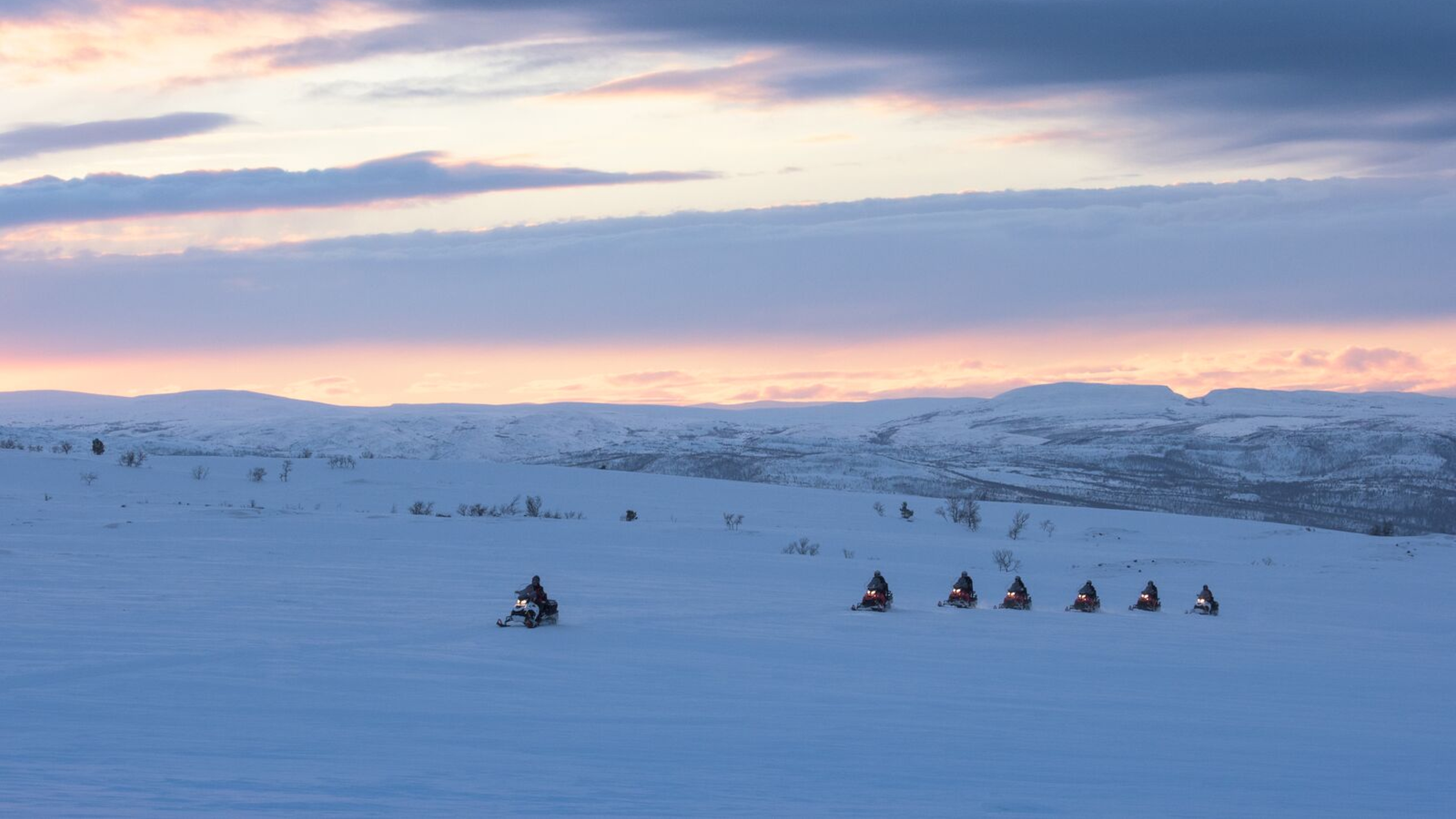 Snowscooters on the Alta river and Finmarksvidda