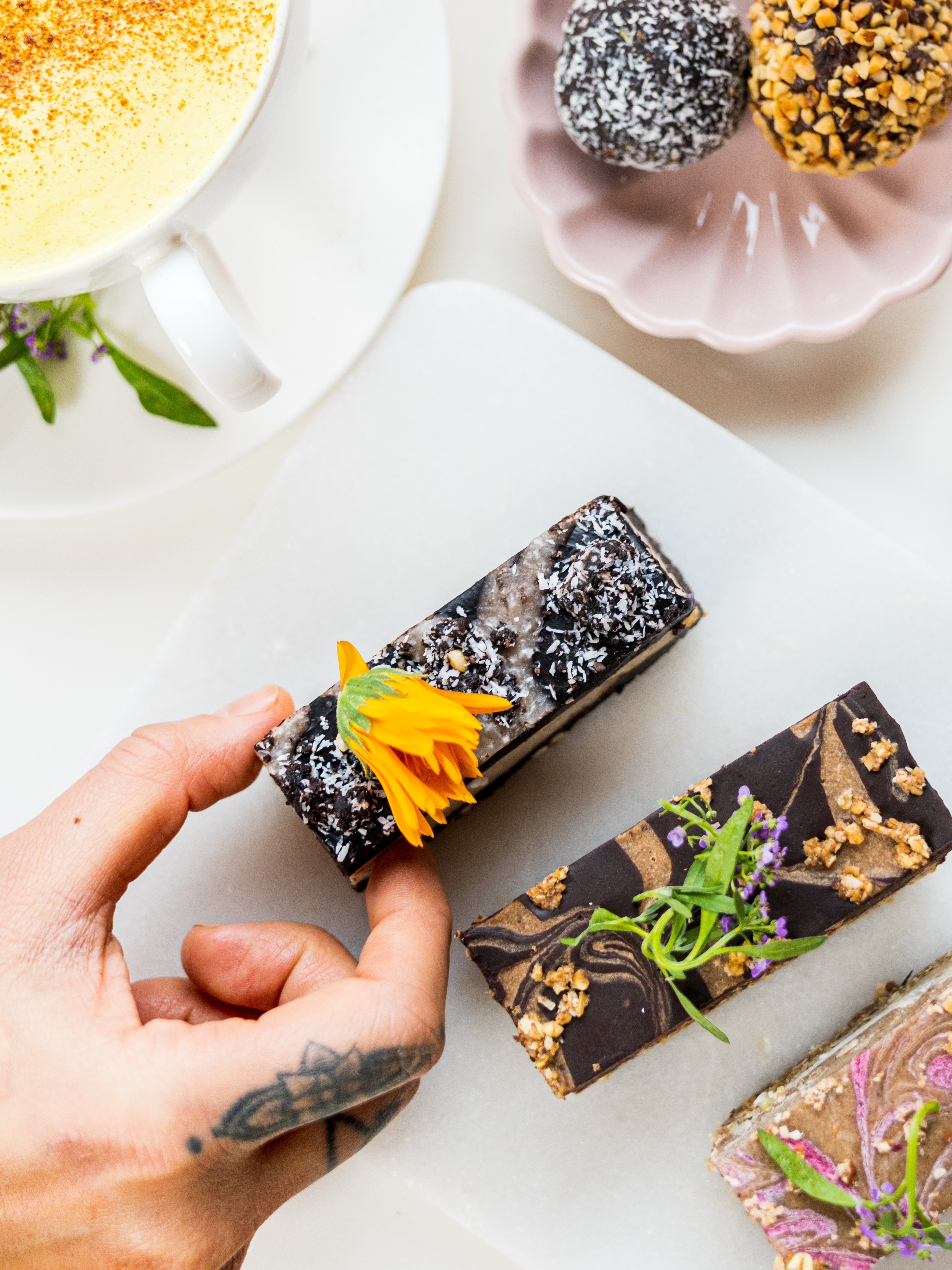 Colorful cakes on a white table