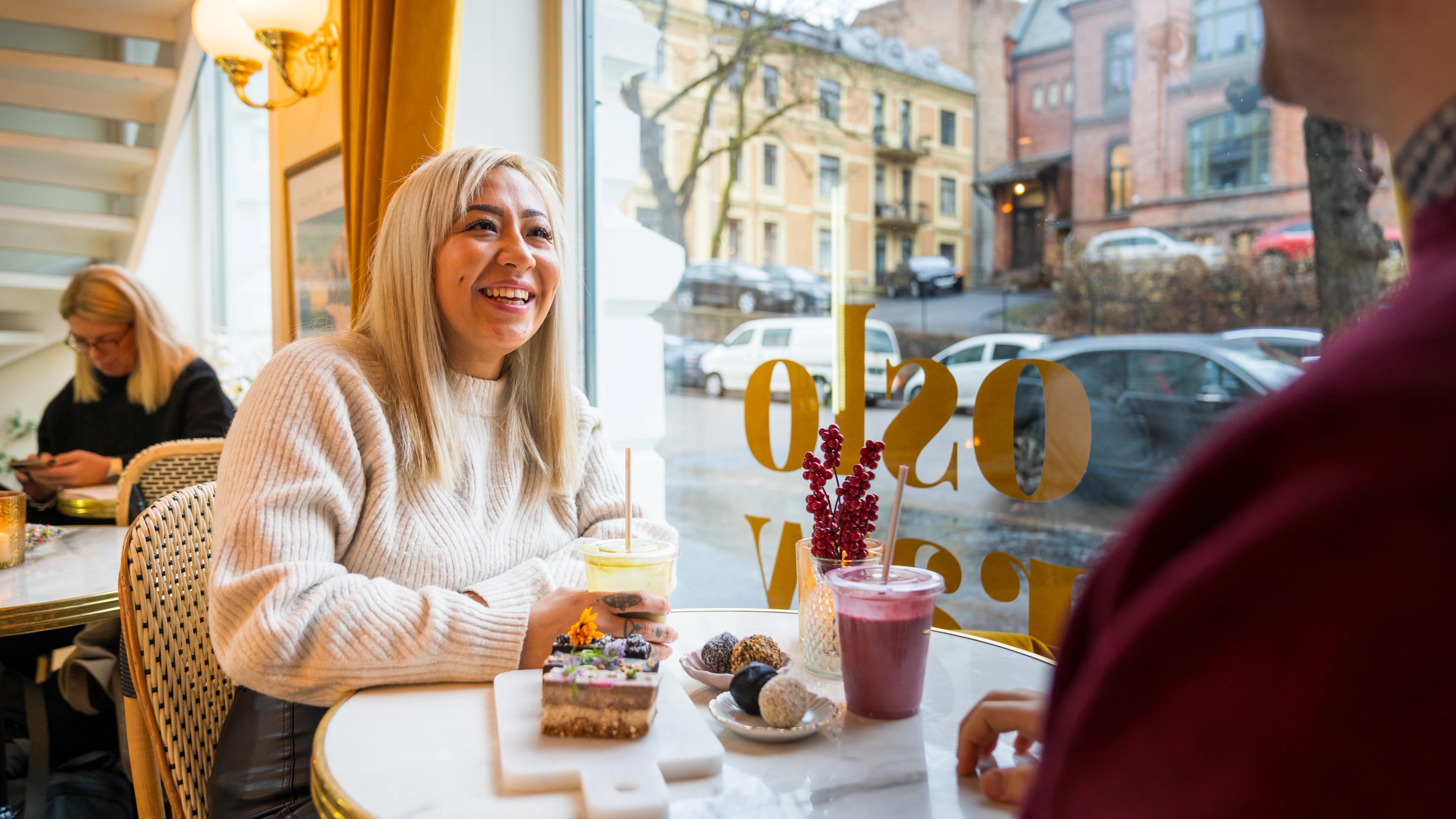 Woman at a cafe in Oslo