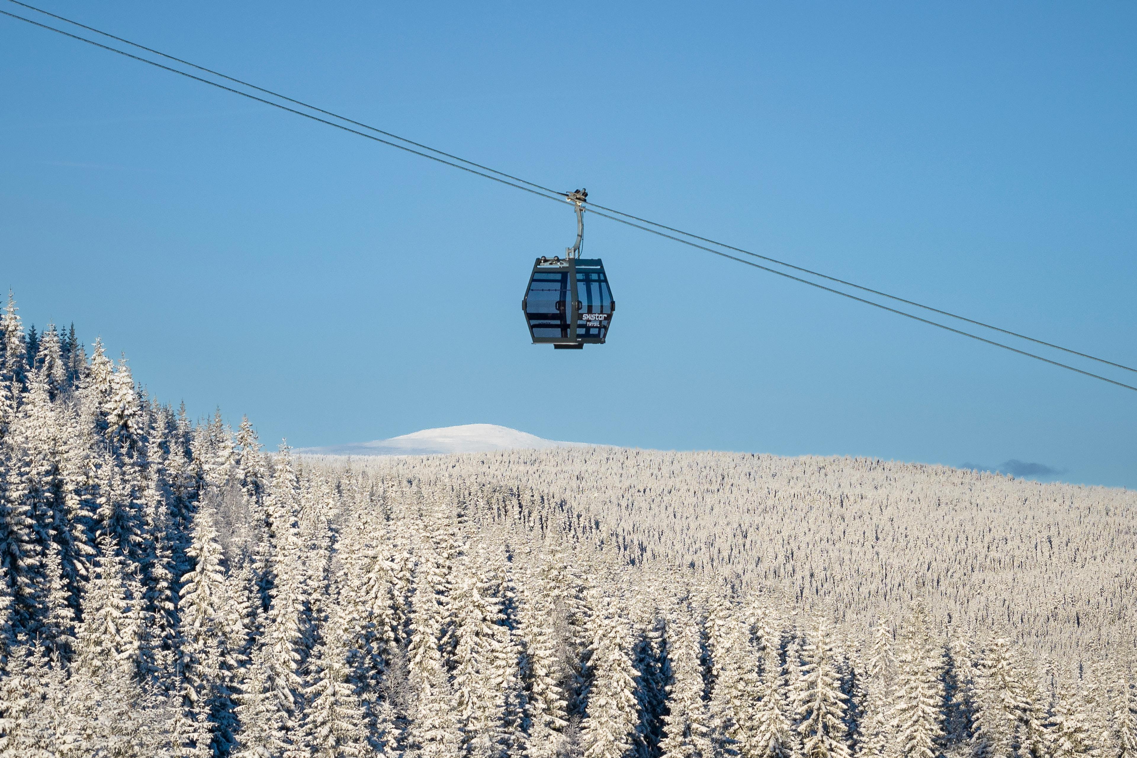 A ski gondala over snow capped fores in Trysil.