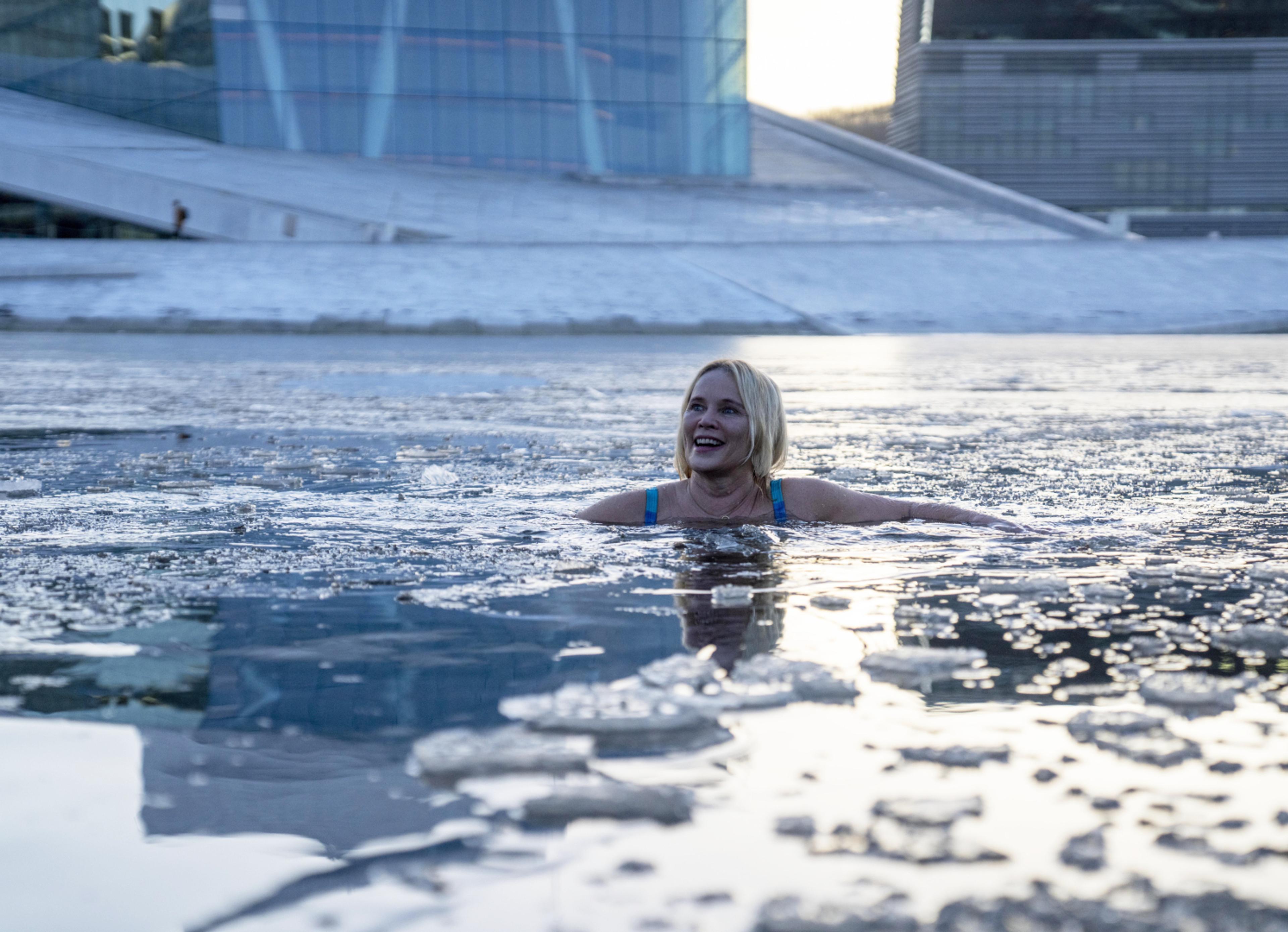 A woman ice bathing in the Oslofjord in Oslo, Eastern Norway