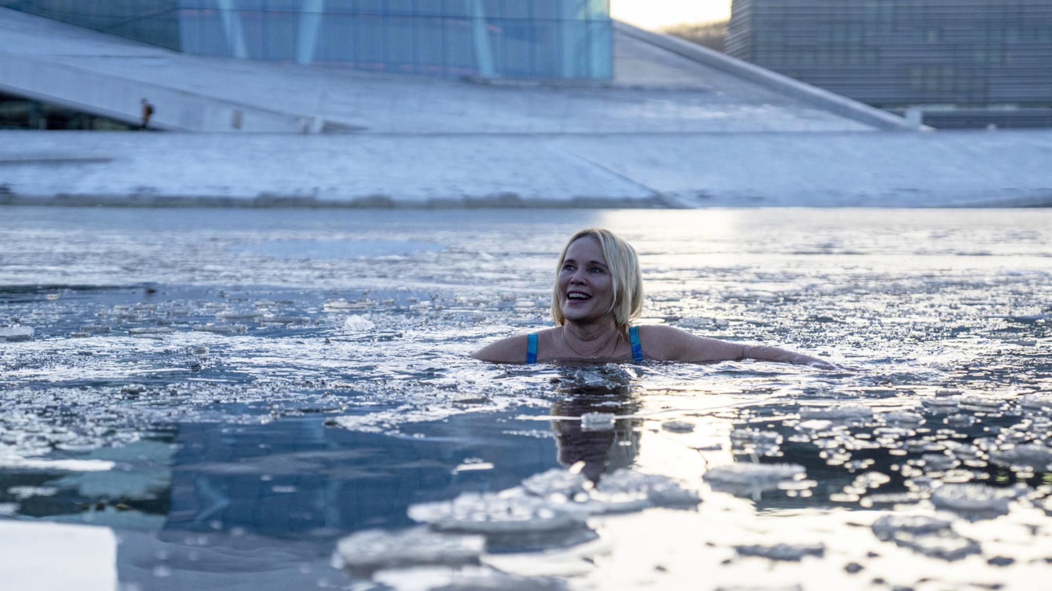 A woman ice bathing in the Oslofjord in Oslo, Eastern Norway