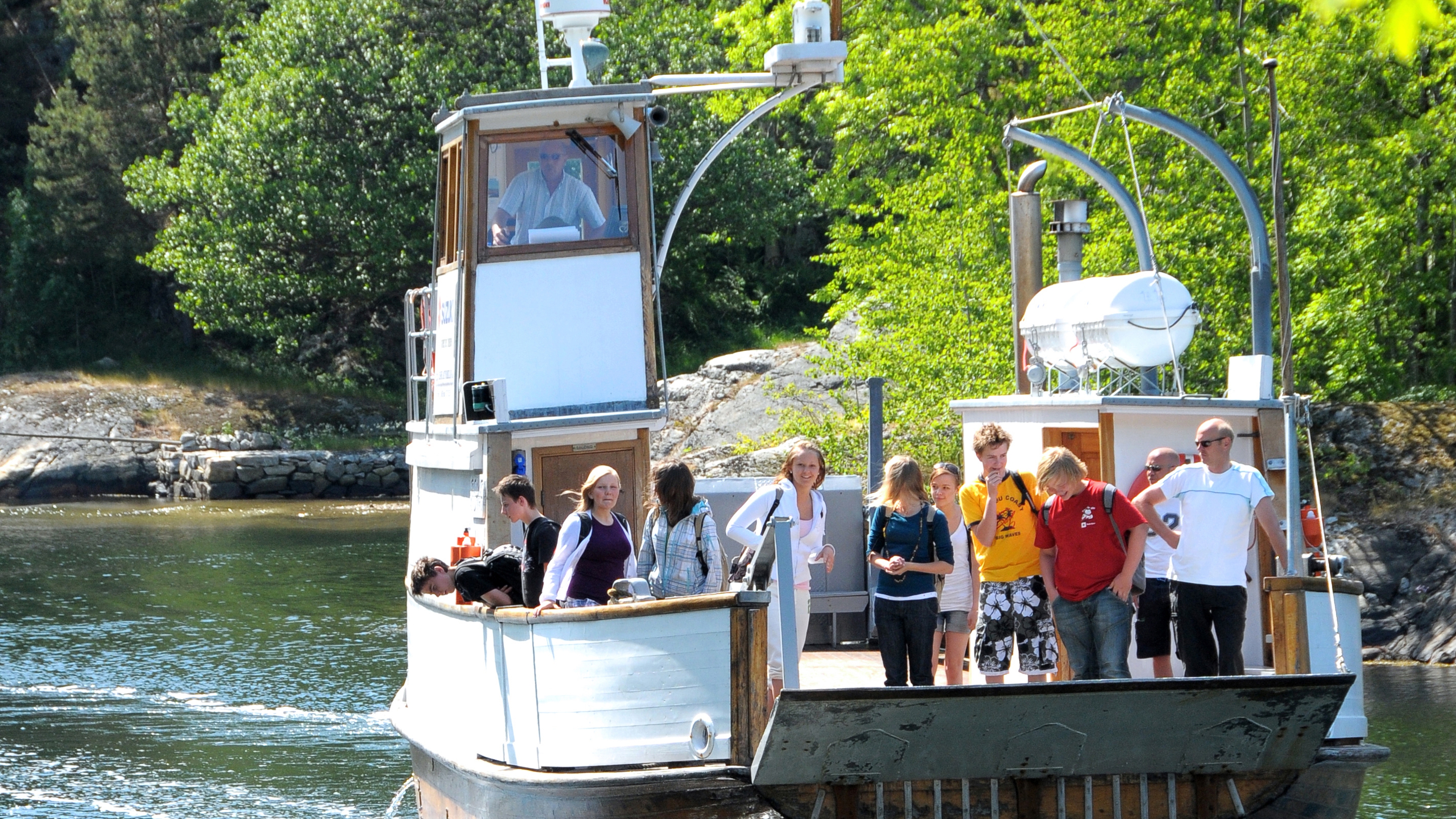 People on M/F Øisang in Risør, Southern Norway.