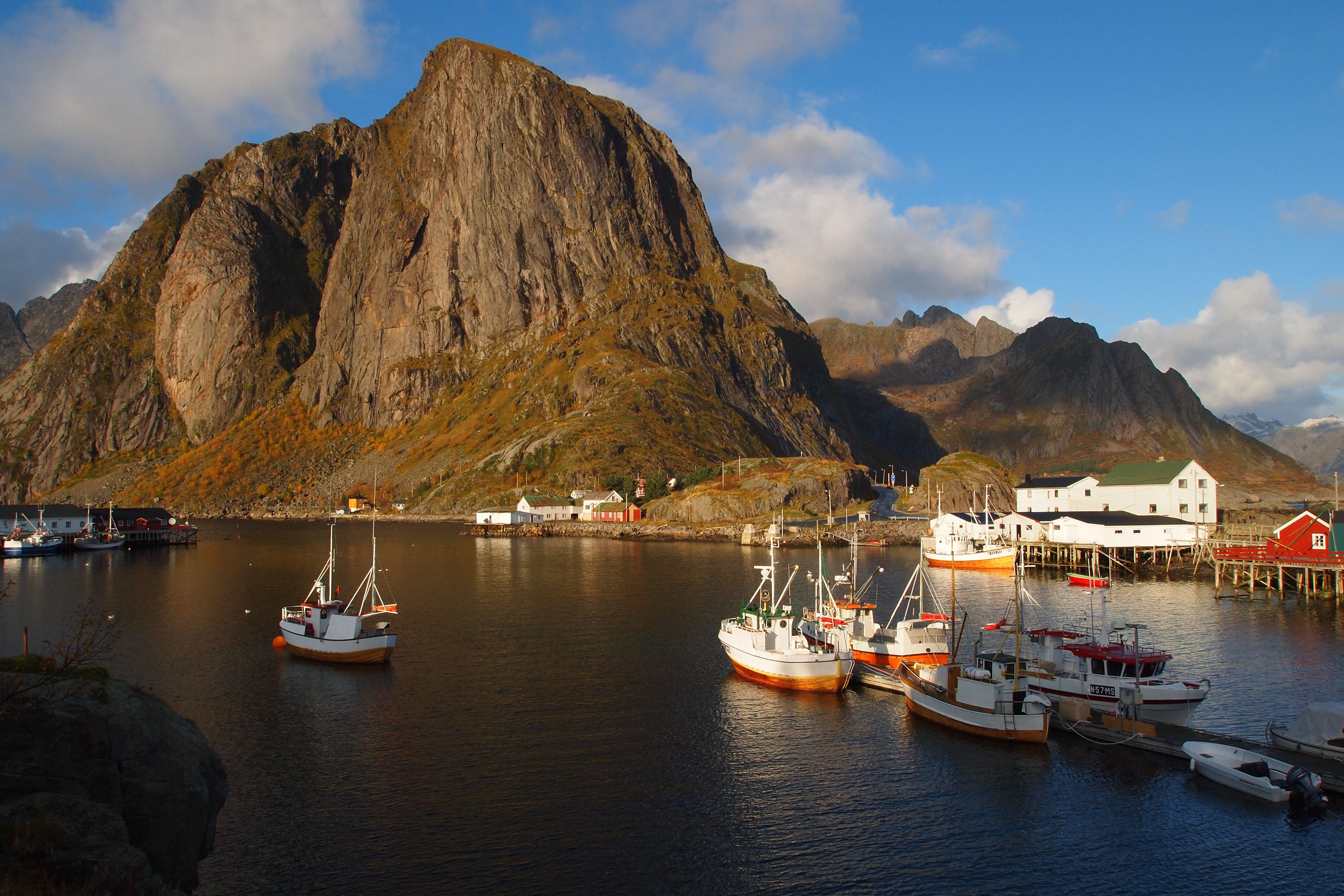 Fisherman´s cabins on a small island below big montains.