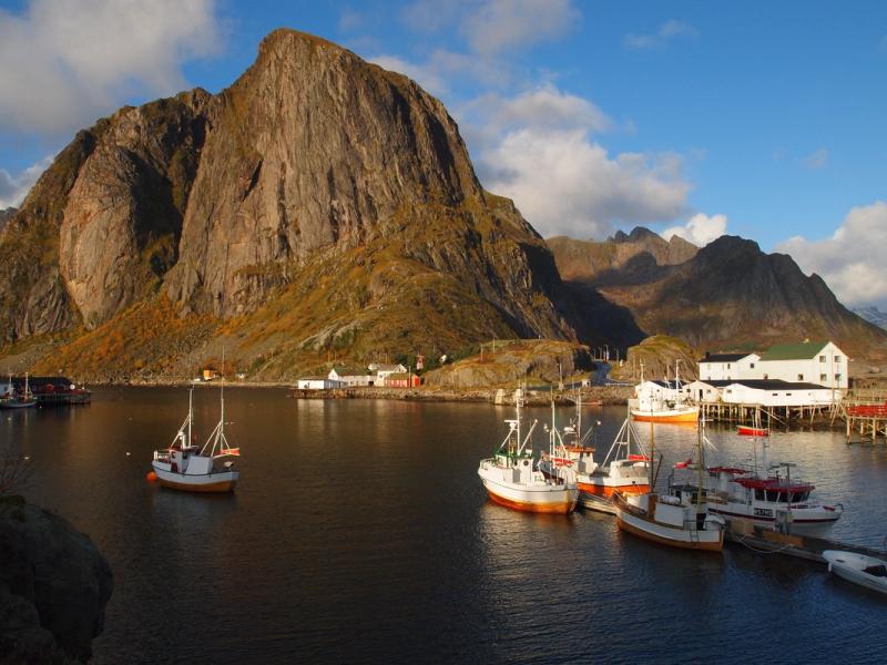 Fisherman´s cabins on a small island below big montains.